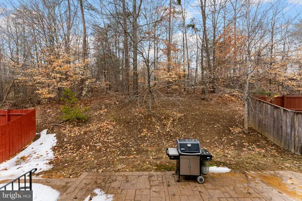a view of a pathway with a bench