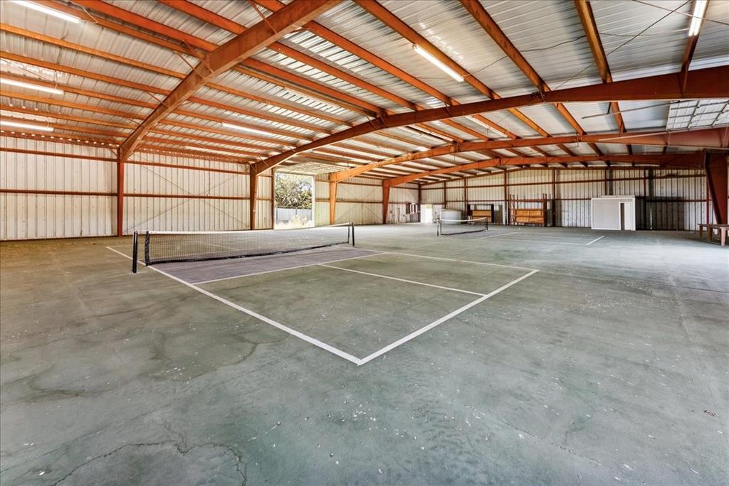 1812 Co 114 Road Mingus, TX 76463 - Photo 3 of 22 a view of an empty room with a projector