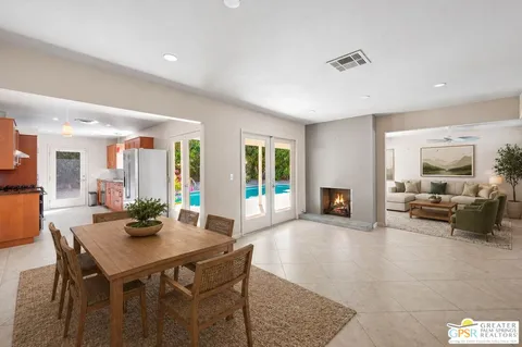 a view of a livingroom with furniture and a table