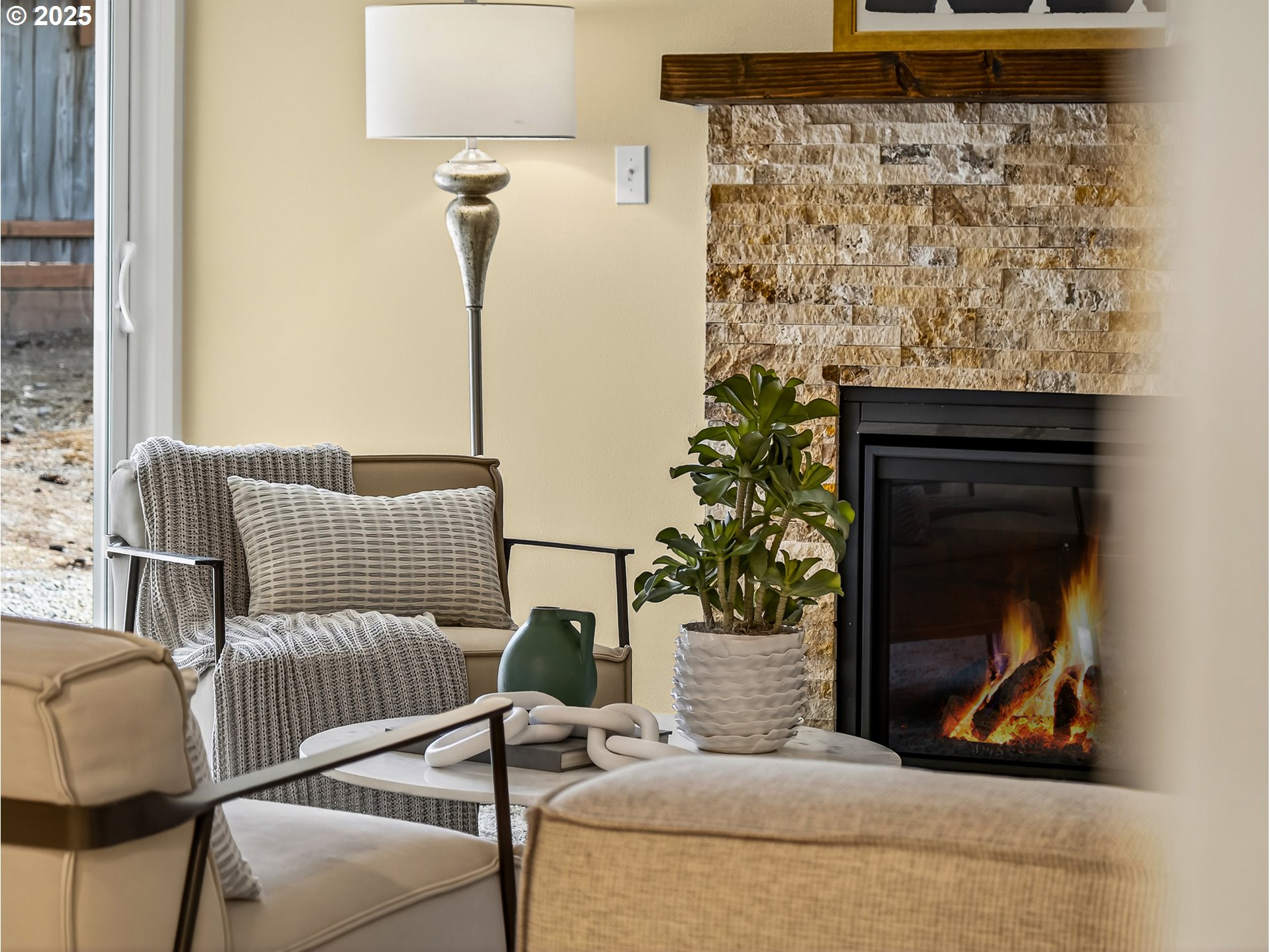 12945 Southwest Hackamore Court Beaverton, OR 97008 - Photo 12 of 48 a living room with a couch and a potted plant