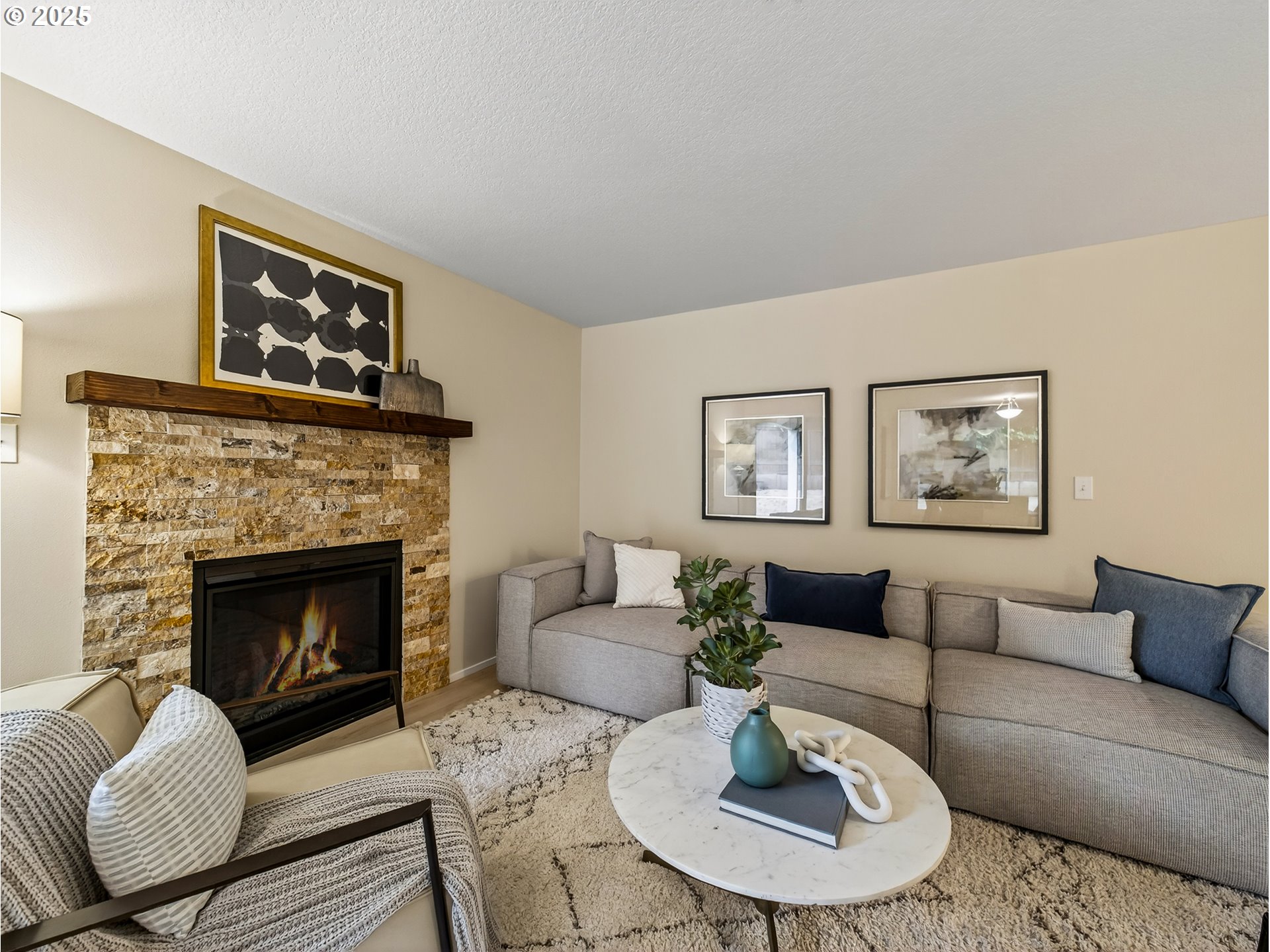 12945 Southwest Hackamore Court Beaverton, OR 97008 - Photo 14 of 48 a living room with furniture and a fireplace
