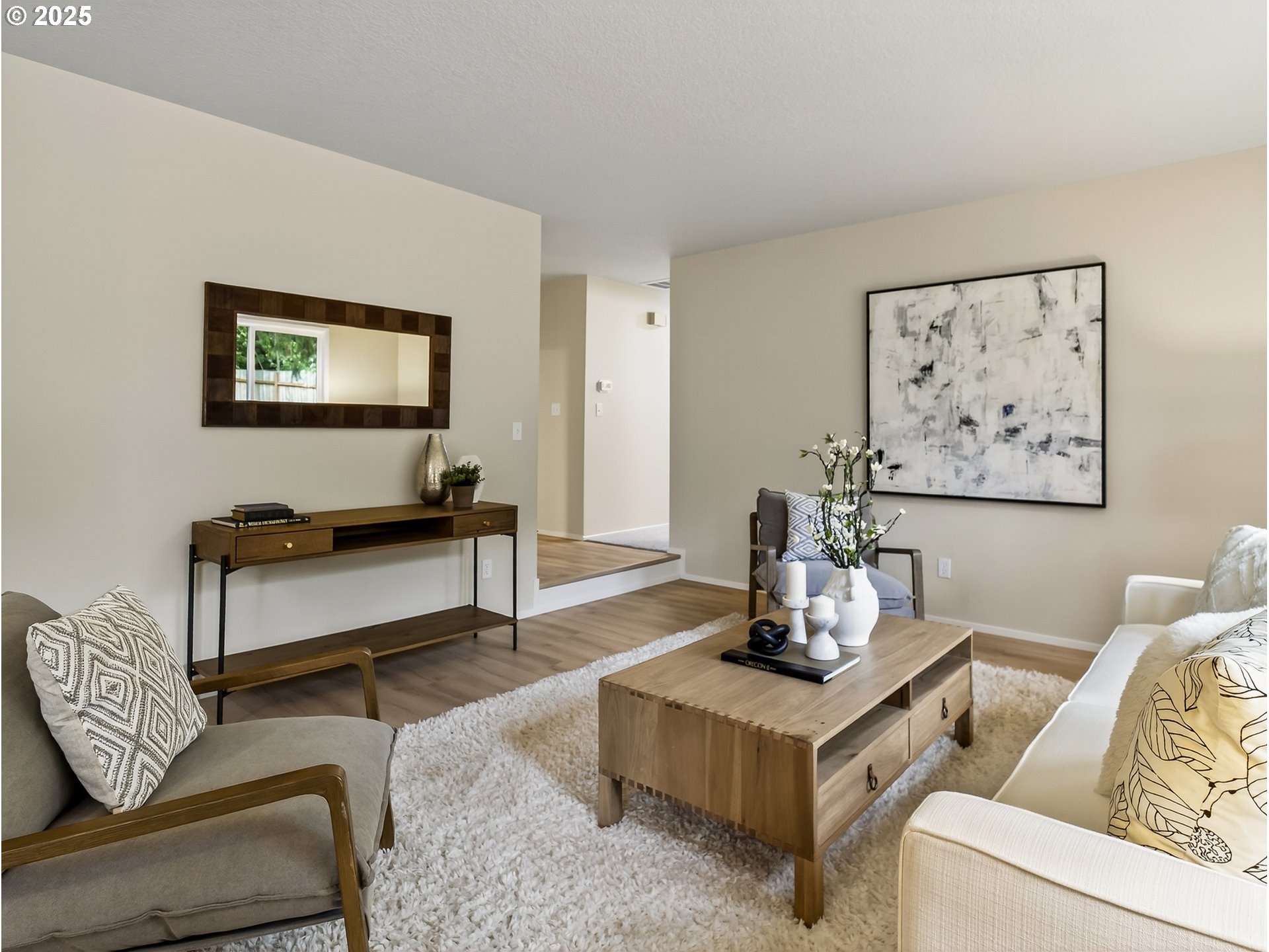 12945 Southwest Hackamore Court Beaverton, OR 97008 - Photo 20 of 48 a living room with furniture and a potted plant