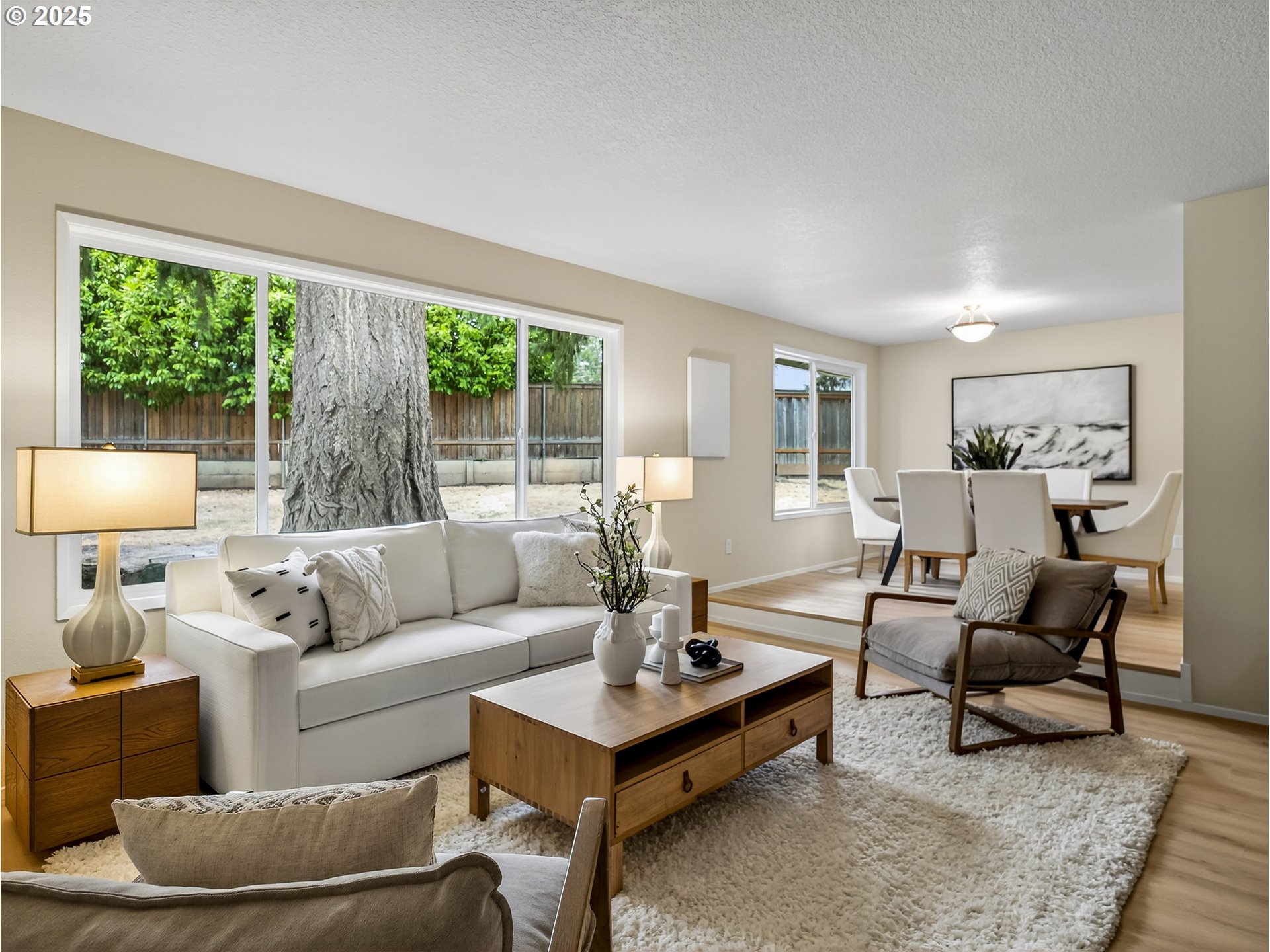 12945 Southwest Hackamore Court Beaverton, OR 97008 - Photo 21 of 48 a living room with furniture and a large window