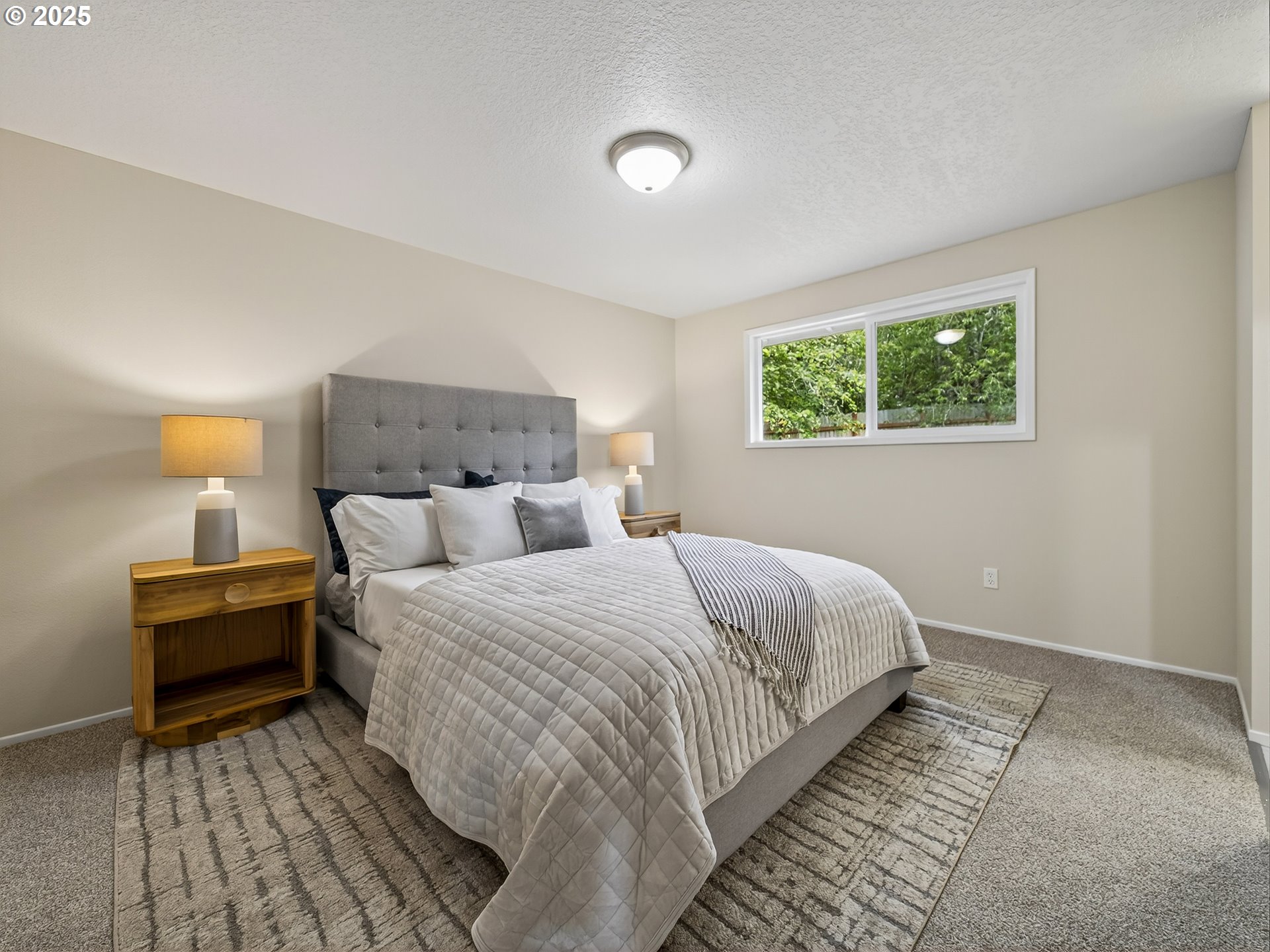 12945 Southwest Hackamore Court Beaverton, OR 97008 - Photo 24 of 48 a bedroom with bed and a window