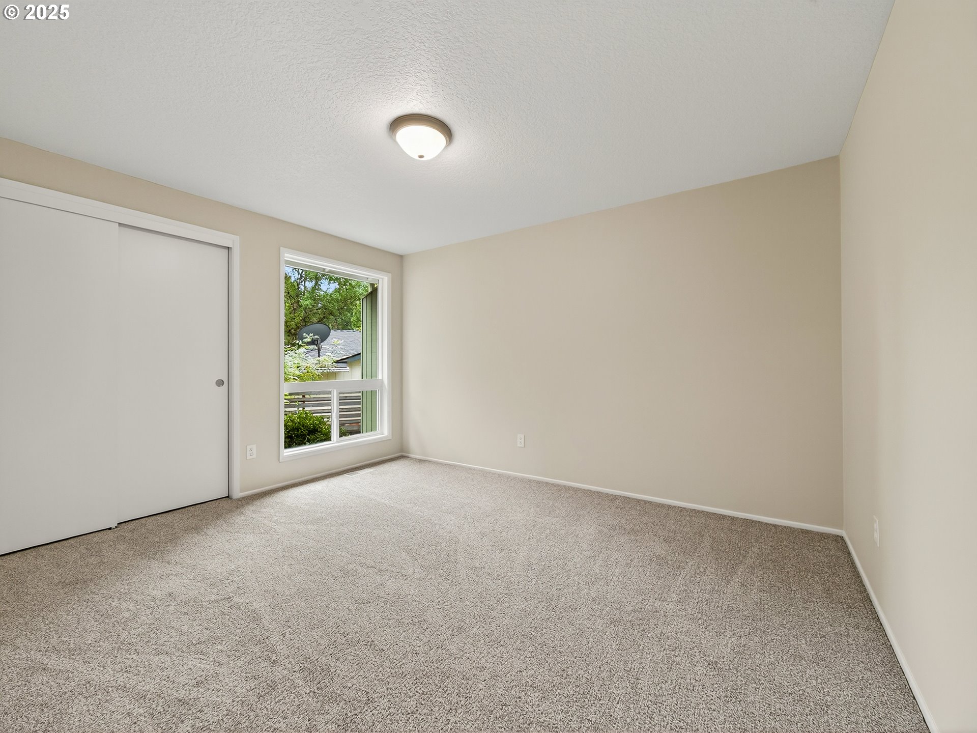 12945 Southwest Hackamore Court Beaverton, OR 97008 - Photo 29 of 48 an empty room with windows