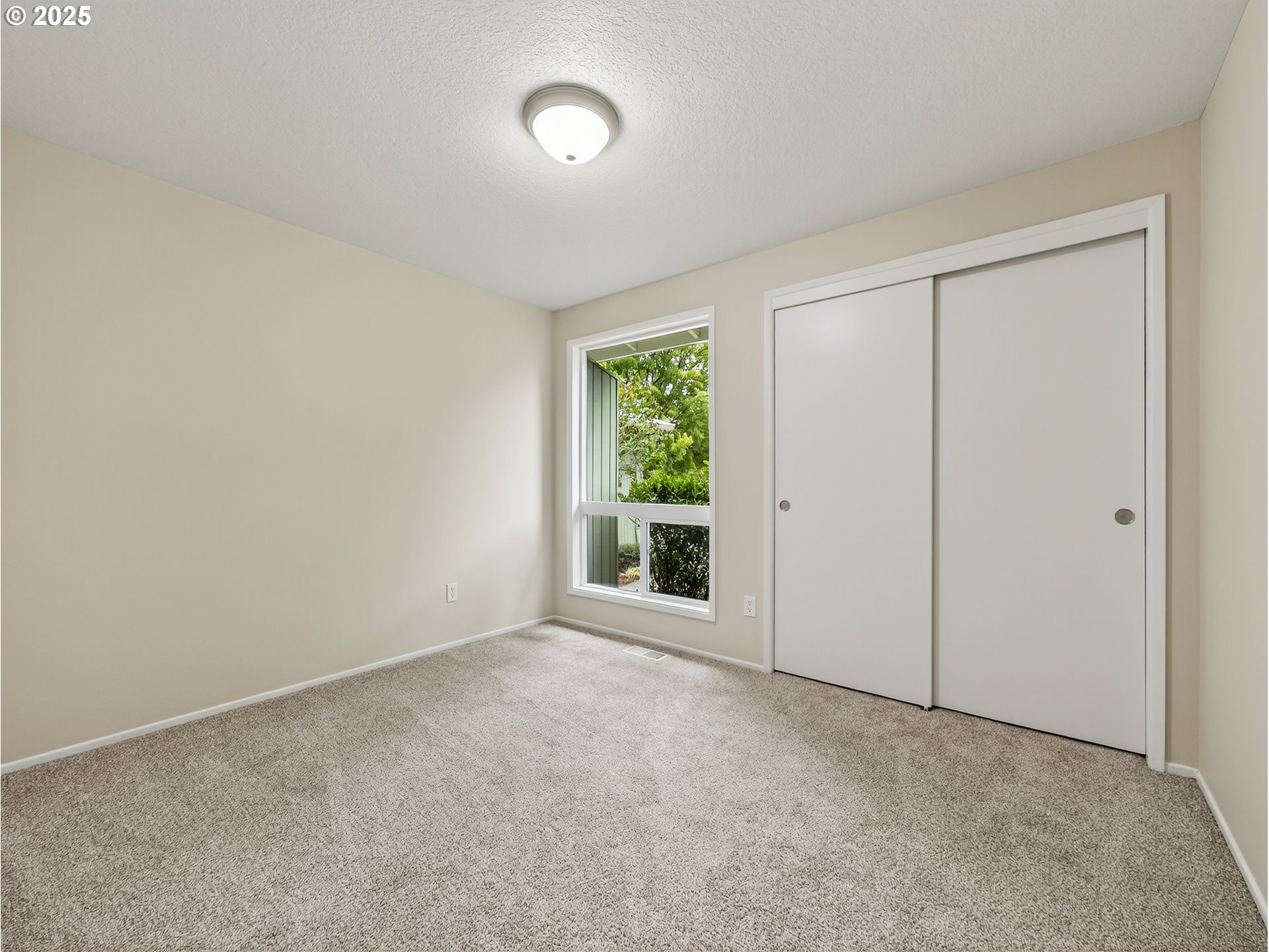 12945 Southwest Hackamore Court Beaverton, OR 97008 - Photo 30 of 48 an empty room with windows