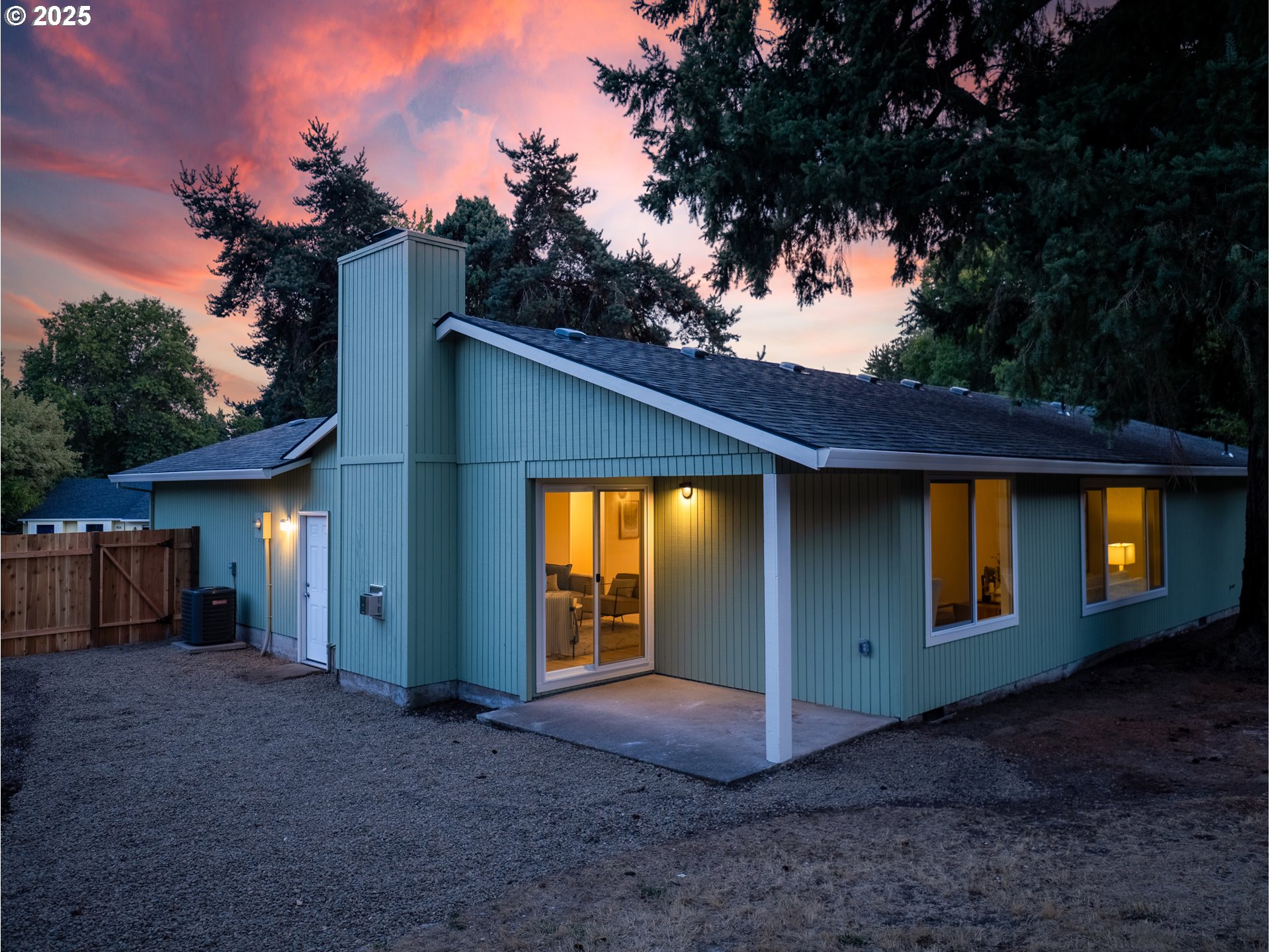 12945 Southwest Hackamore Court Beaverton, OR 97008 - Photo 40 of 48 a view of a house with backyard and a tree