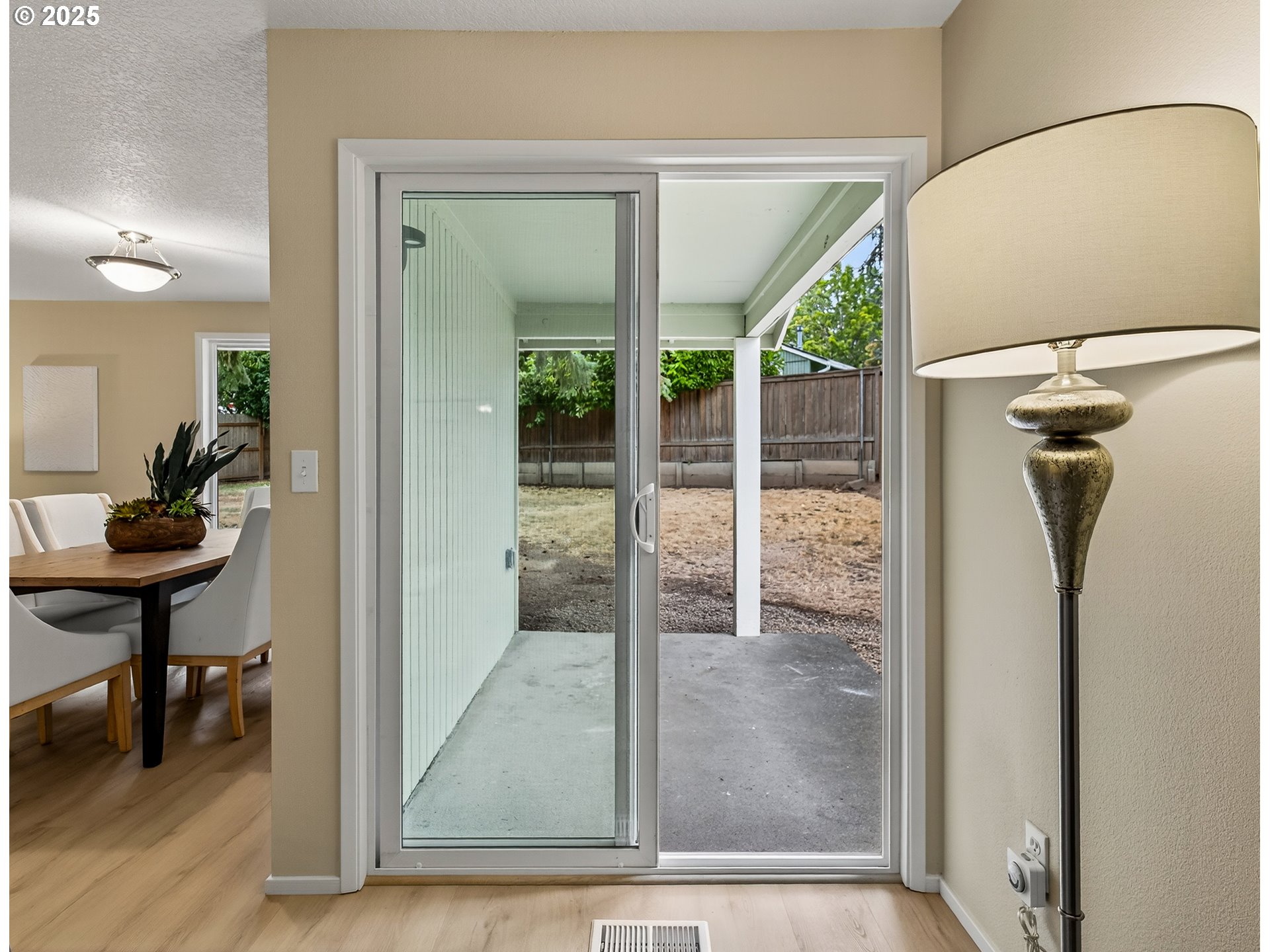 12945 Southwest Hackamore Court Beaverton, OR 97008 - Photo 43 of 48 a view of a hallway and a livingroom with furniture