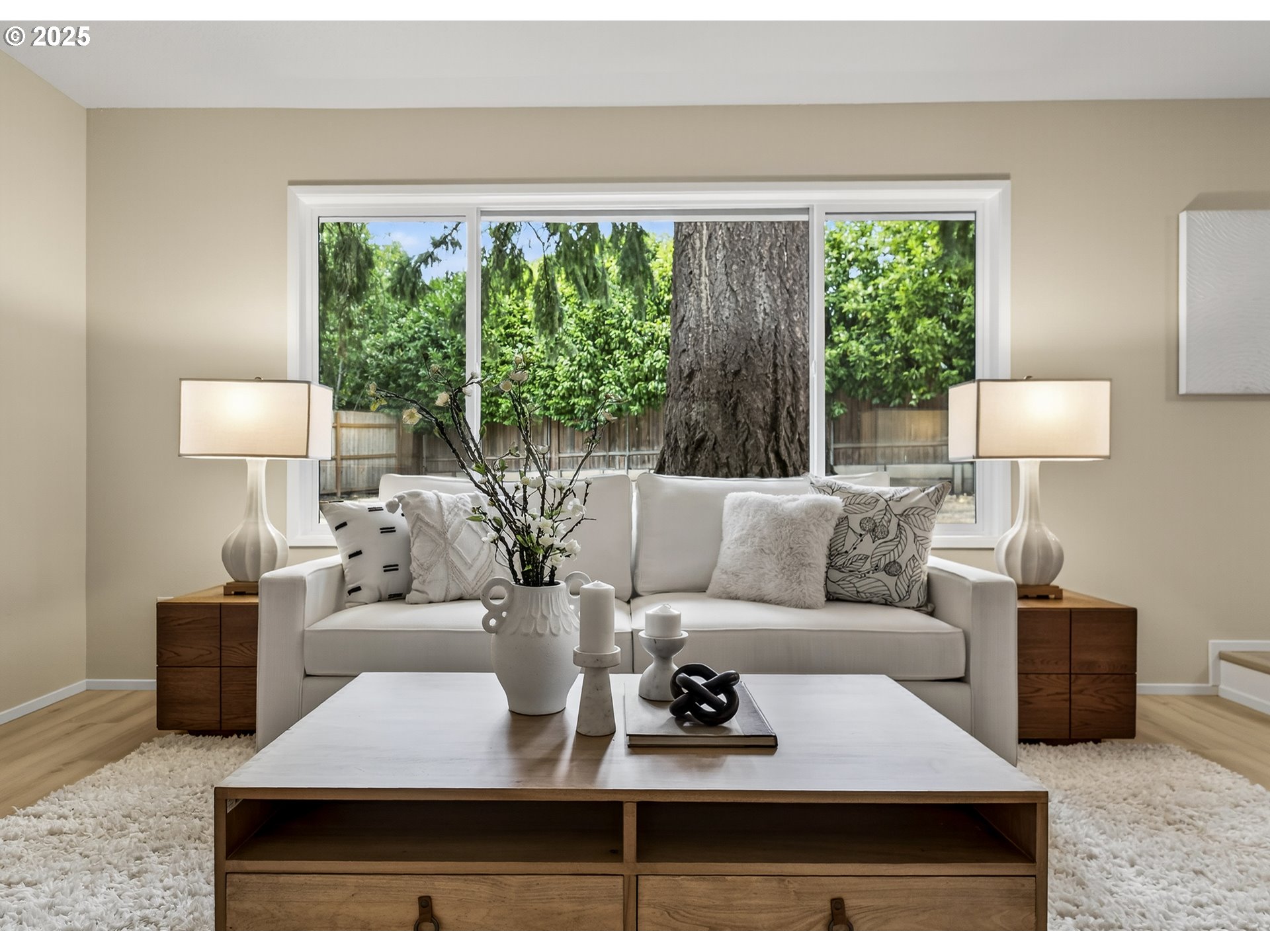 12945 Southwest Hackamore Court Beaverton, OR 97008 - Photo 46 of 48 a living room with furniture and a lamp