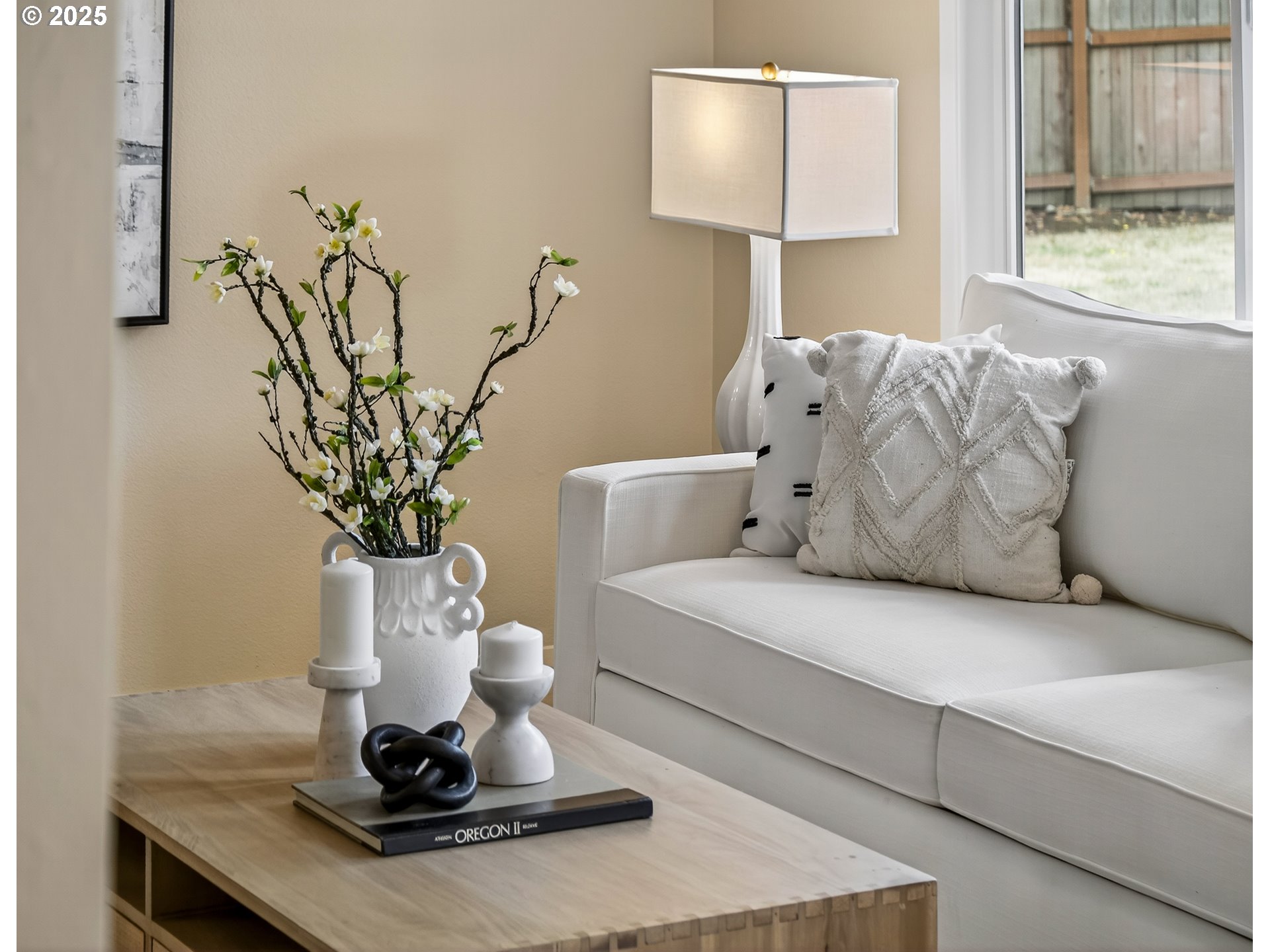 12945 Southwest Hackamore Court Beaverton, OR 97008 - Photo 47 of 48 a living room with furniture and a potted plant