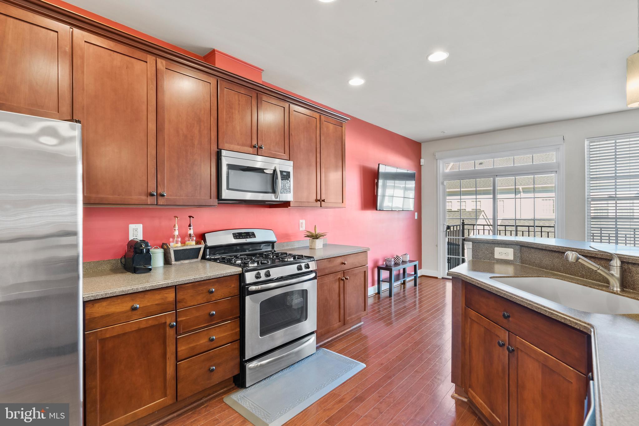 5787 Richards Valley Road Ellicott City, MD 21043 - Photo 15 of 52 SS Appliances and Corian counter top
