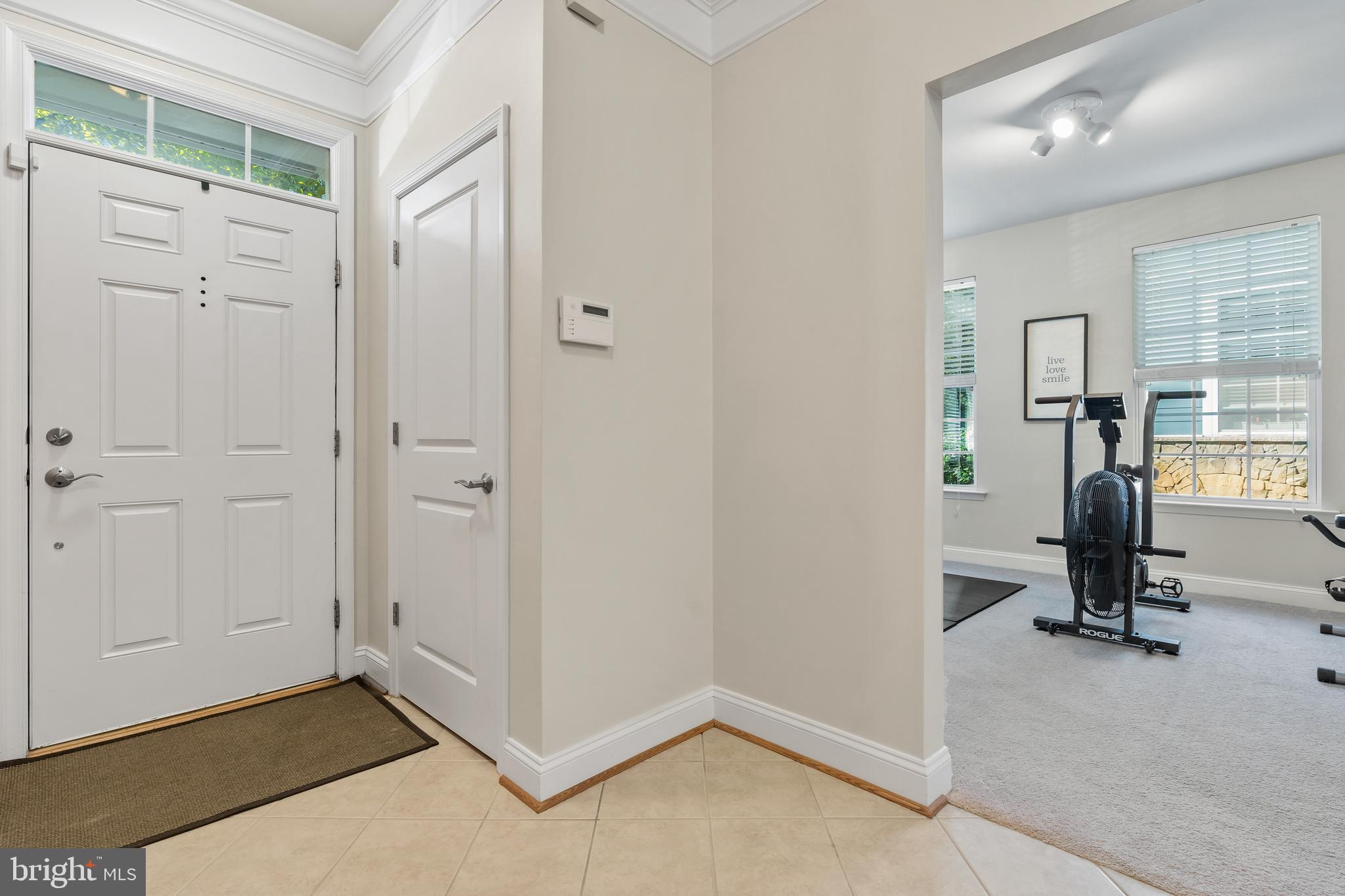 5787 Richards Valley Road Ellicott City, MD 21043 - Photo 4 of 52 Inviting entry foyer w/neutral 8x8 designer tiles