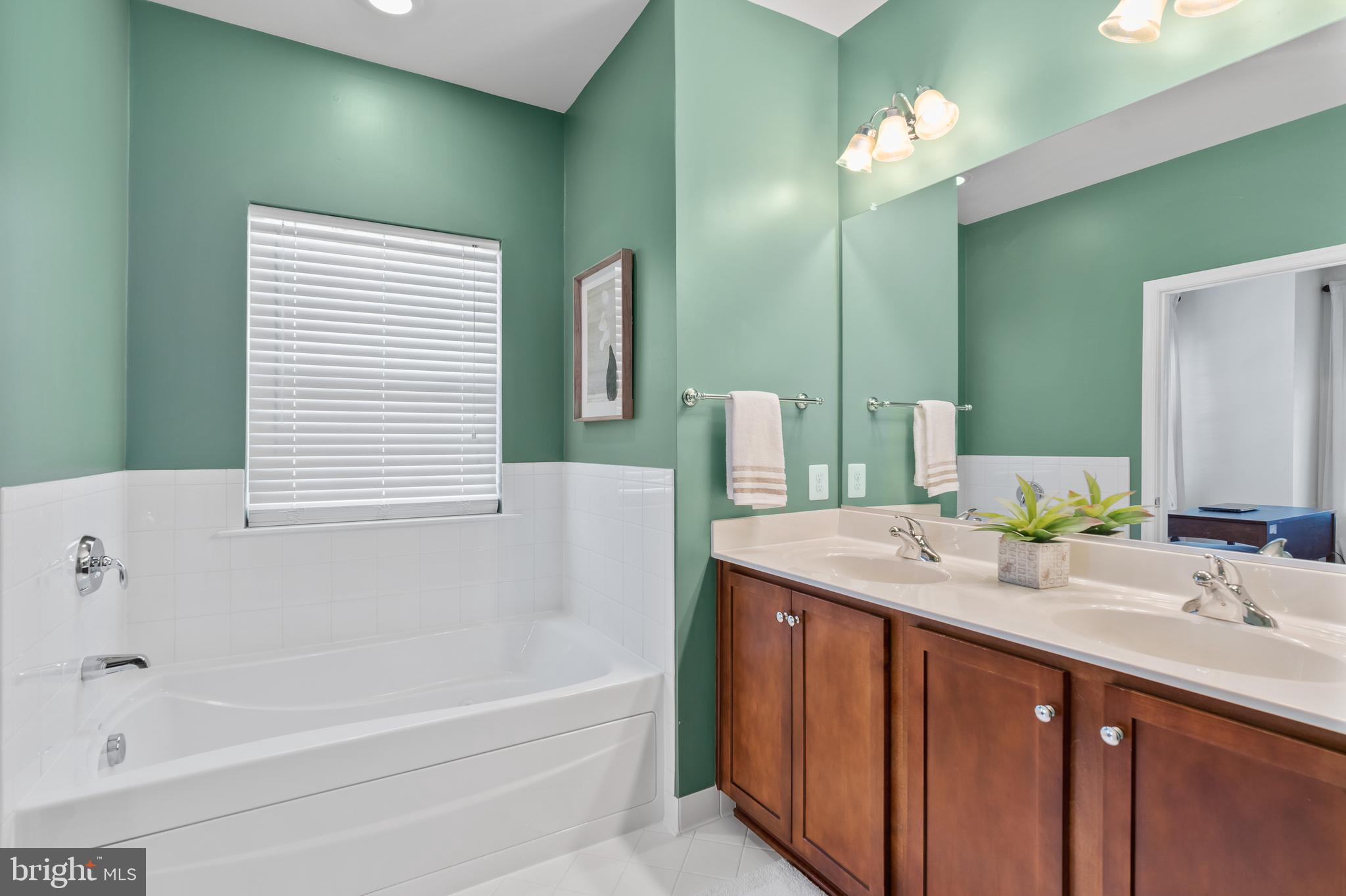 5787 Richards Valley Road Ellicott City, MD 21043 - Photo 36 of 52 Whirlpool tub & separate shower,ceramic tile floor