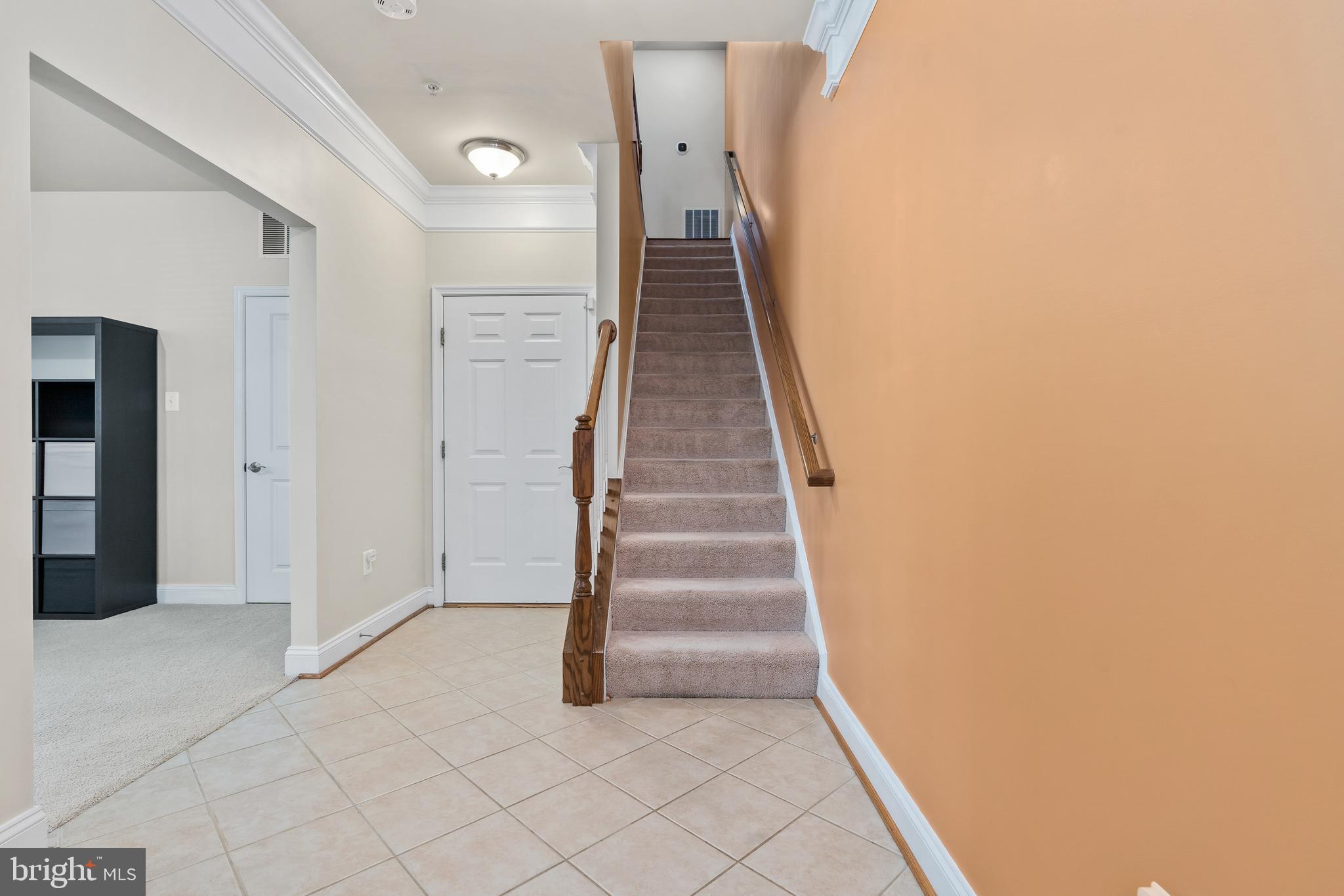 5787 Richards Valley Road Ellicott City, MD 21043 - Photo 9 of 52 Hall way to garage and stairs to main upper 1