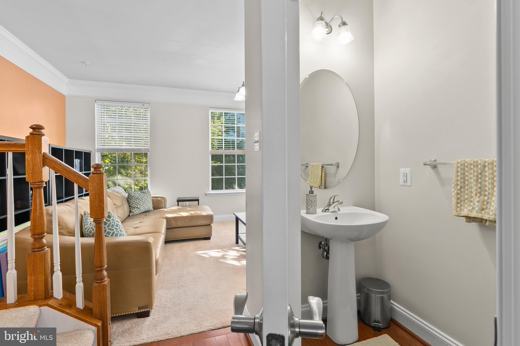 5787 Richards Valley Road Ellicott City, MD 21043 - Photo 10 of 52 Gleaming hardwood floors, clean Guest Powder room
