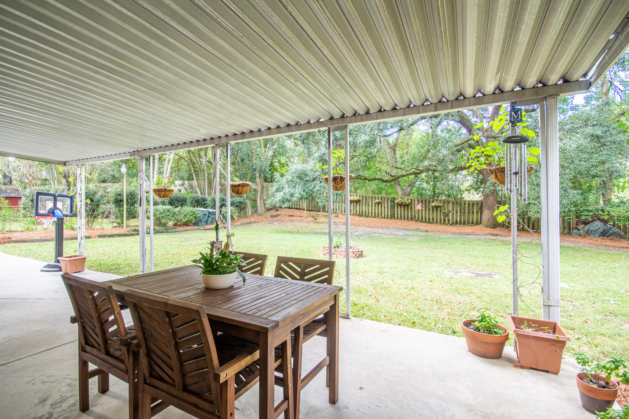 6021 Rembert Drive Hanahan, SC 29410 - Photo 23 of 30 Covered Rear Patio