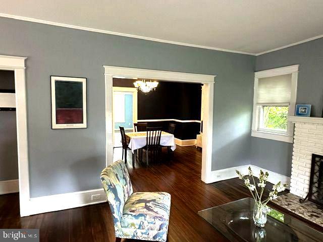 4608 West Virginia Avenue Bethesda, MD 20814 - Photo 26 of 61 a living room with furniture and a flat screen tv