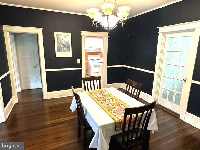 4608 West Virginia Avenue Bethesda, MD 20814 - Photo 27 of 61 a view of a dining room with furniture window and wooden floor