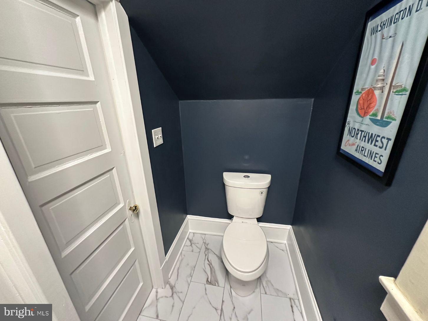 4608 West Virginia Avenue Bethesda, MD 20814 - Photo 52 of 61 a bathroom with a toilet and a shower