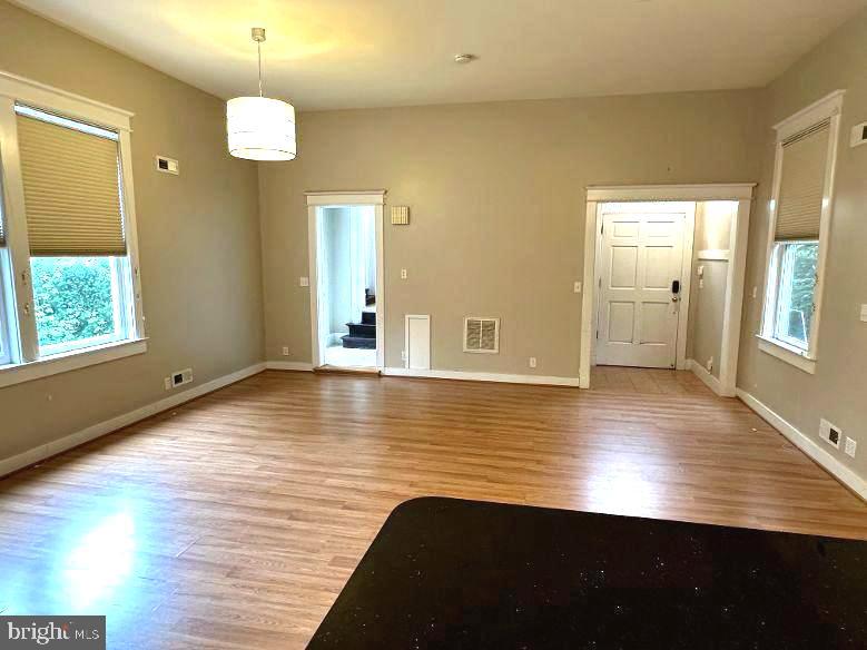 4608 West Virginia Avenue Bethesda, MD 20814 - Photo 61 of 61 a view of room with window and wooden floor