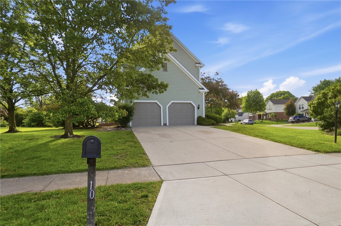 10 Chase Court Springboro, OH 45066 - Photo 68 of 75 This residence features a well-maintained exterior and a spacious driveway in a pleasant neighborhood setting.