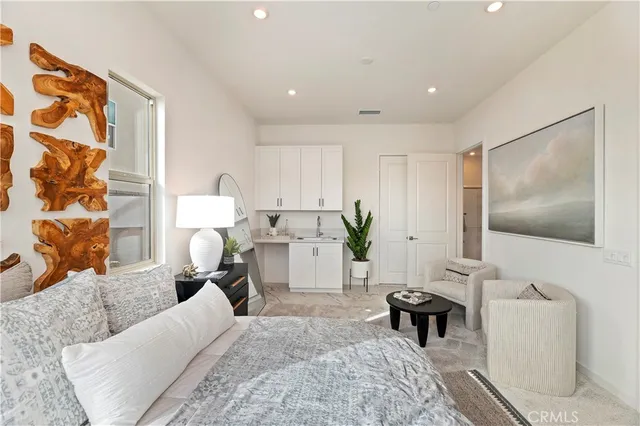 a living room with furniture fireplace and a flat screen tv