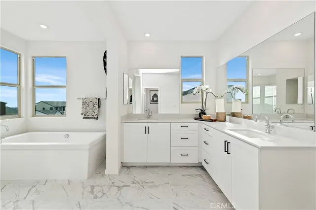 a view of a balcony with two chairs