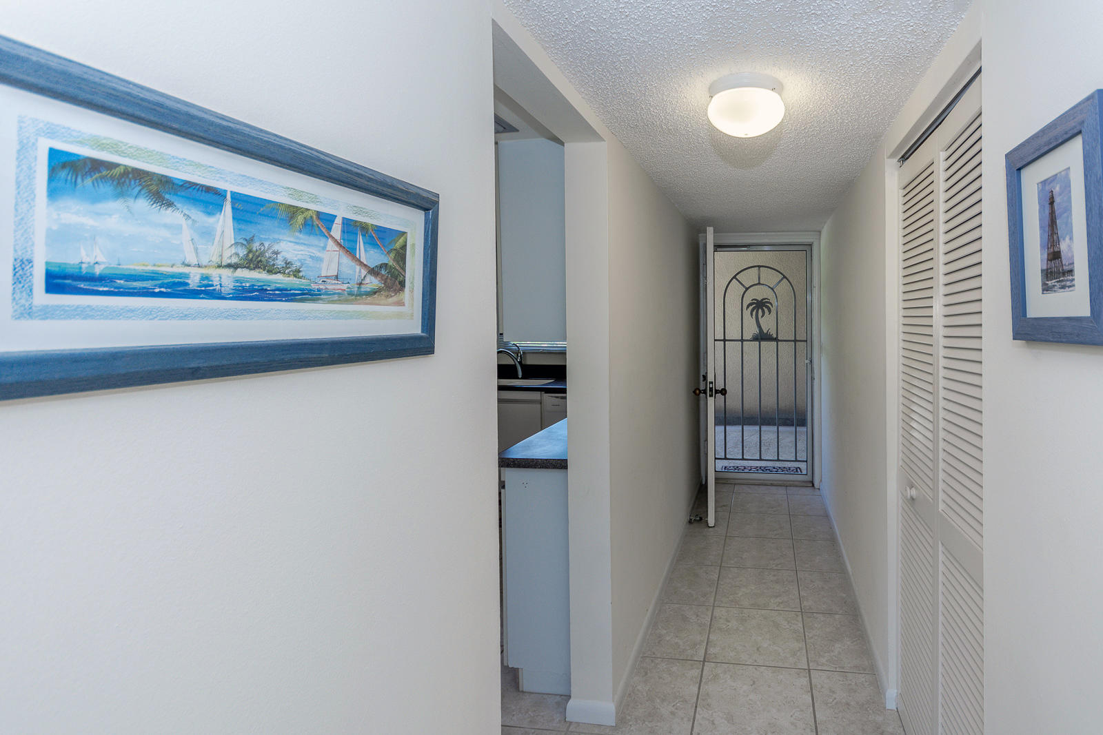 1100 Surf Road, Unit 211 Singer Island, FL 33404 - Photo 21 of 30 Walk way home