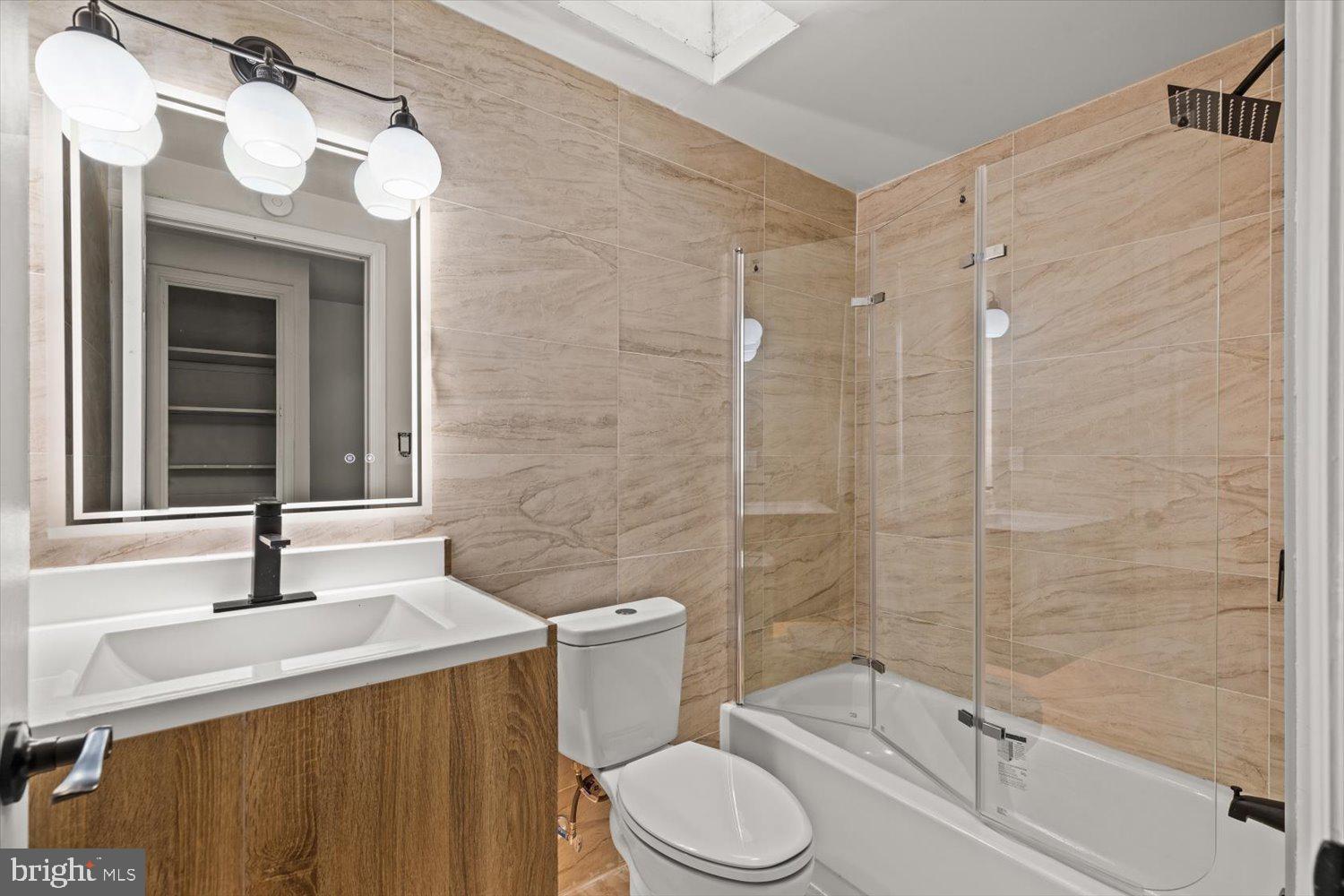 414 Fairview Avenue Lancaster, PA 17603 - Photo 14 of 29 a bathroom with a sink a toilet and shower