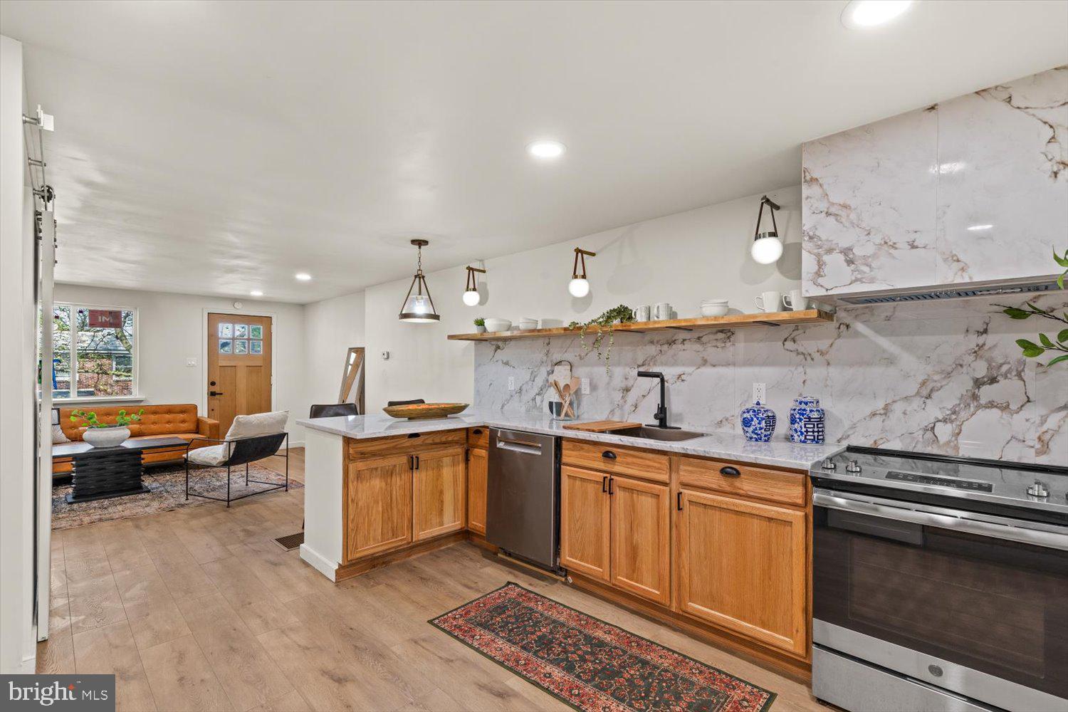 414 Fairview Avenue Lancaster, PA 17603 - Photo 6 of 29 a kitchen with stainless steel appliances granite countertop a sink and cabinets