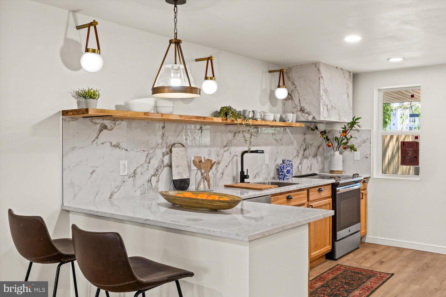 414 Fairview Avenue Lancaster, PA 17603 - Photo 9 of 29 a kitchen with a table and chairs in it