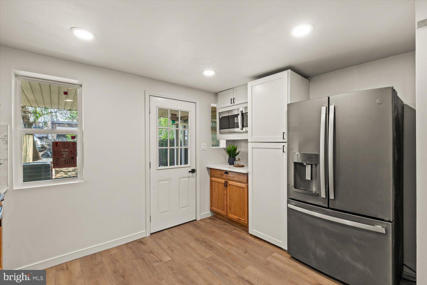 414 Fairview Avenue Lancaster, PA 17603 - Photo 10 of 29 a kitchen with stainless steel appliances granite countertop a refrigerator and a stove top oven