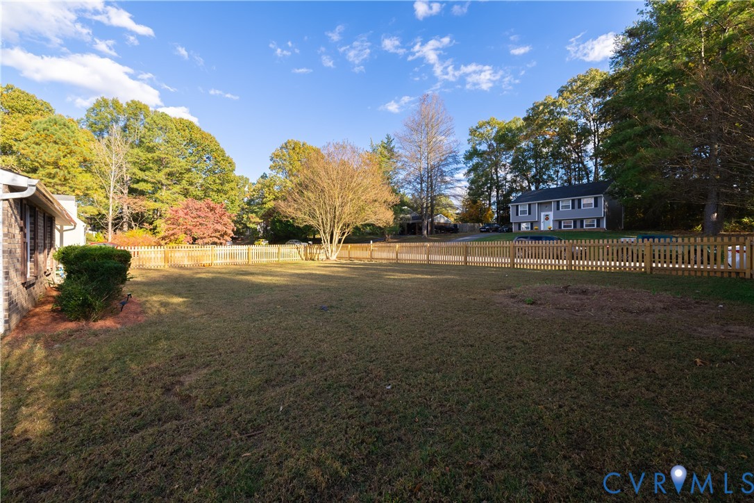 6310 Dahlia Road Mechanicsville, VA 23111 - Photo 4 of 38 a view of road with trees