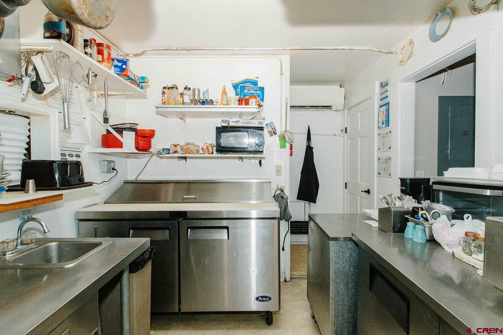 807 Main Street, Unit 3 Ouray, CO 81427 - Photo 11 of 26 a utility room with sink dryer and washer