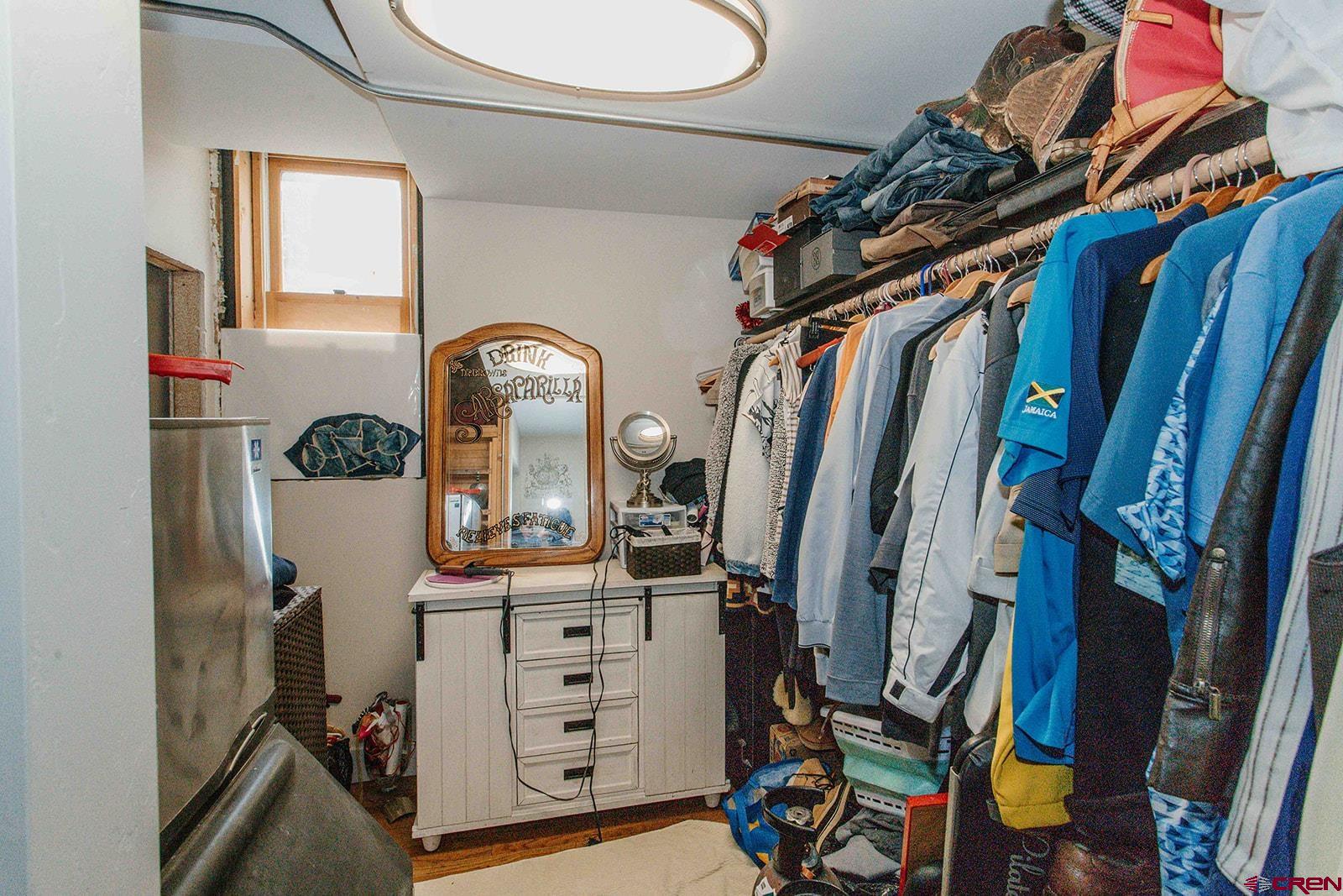 807 Main Street, Unit 3 Ouray, CO 81427 - Photo 17 of 26 a view of walk in closet with clothes and shoes