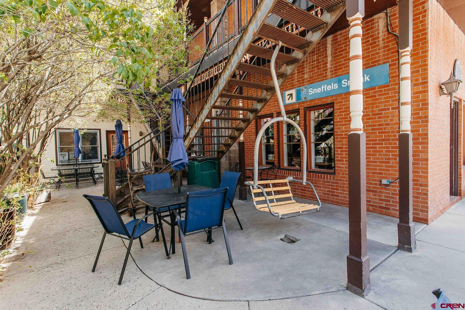 807 Main Street, Unit 3 Ouray, CO 81427 - Photo 24 of 26 a view of a chairs and tables in the patio