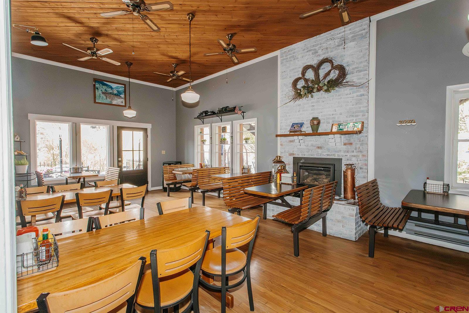 807 Main Street, Unit 3 Ouray, CO 81427 - Photo 8 of 26 a outdoor space with lots of furniture and wooden floor