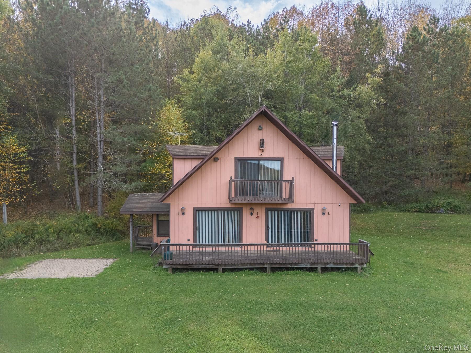 515 Magic Mountain Road Bloomville, NY 13739 - Photo 2 of 18 a view of a house with a yard