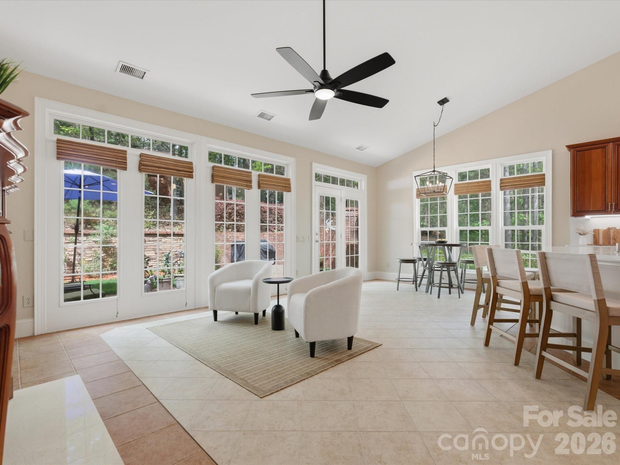 809 Savile Lane Fort Mill, SC 29715 - Photo 14 of 48 a living room with furniture and large windows