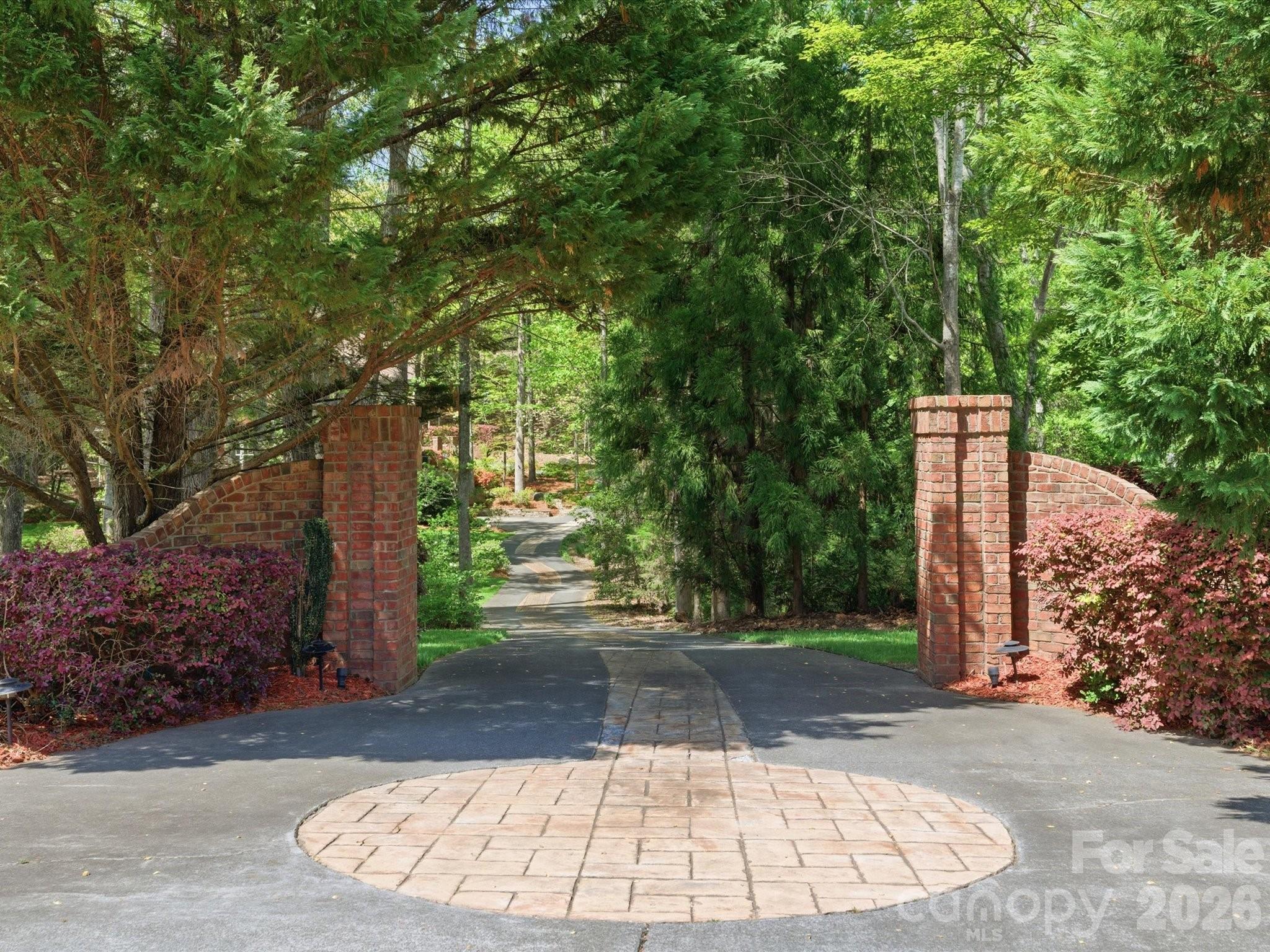 809 Savile Lane Fort Mill, SC 29715 - Photo 2 of 48 a view of a backyard with large trees