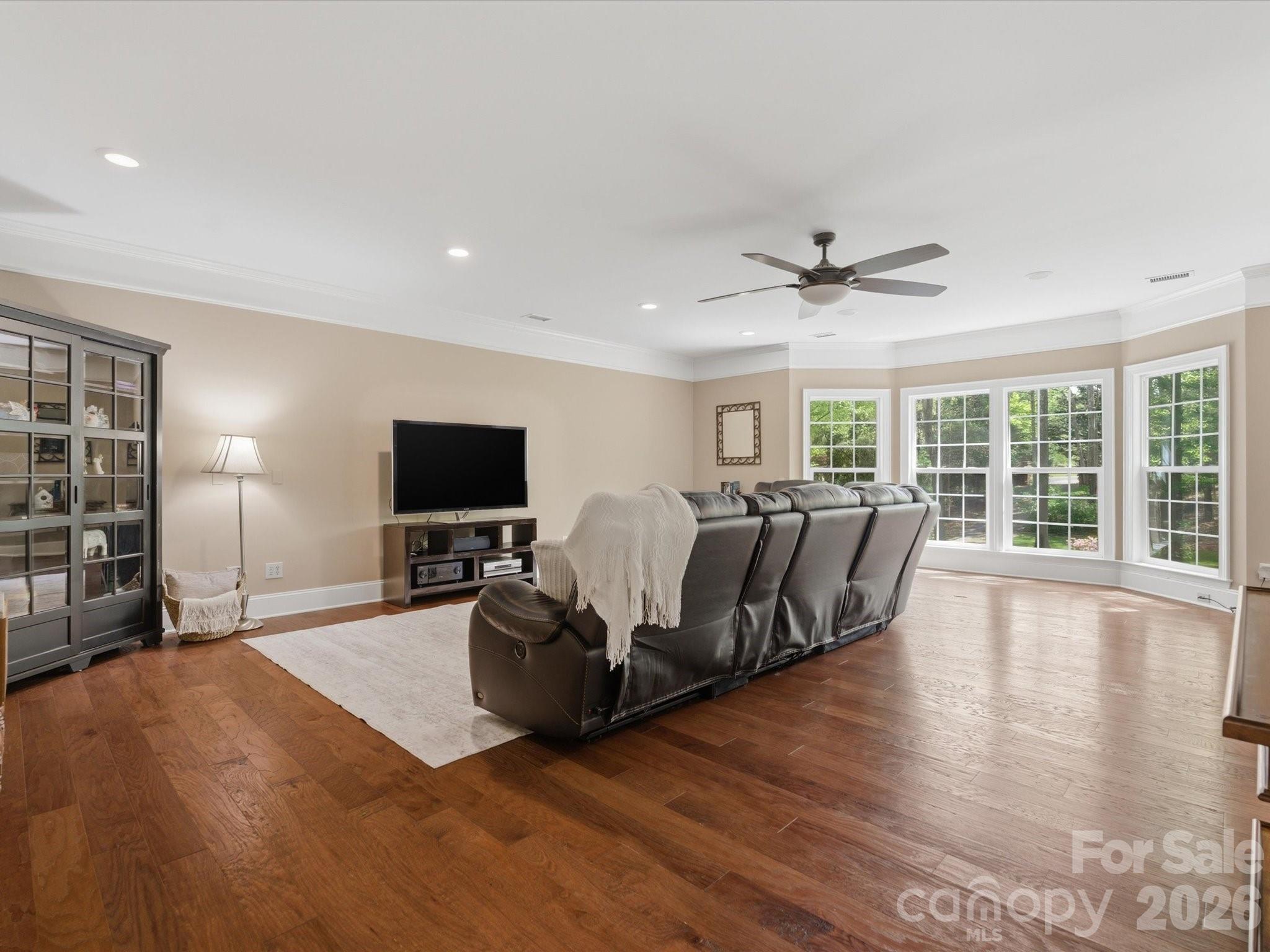 809 Savile Lane Fort Mill, SC 29715 - Photo 22 of 48 a living room with furniture window and a flat screen tv