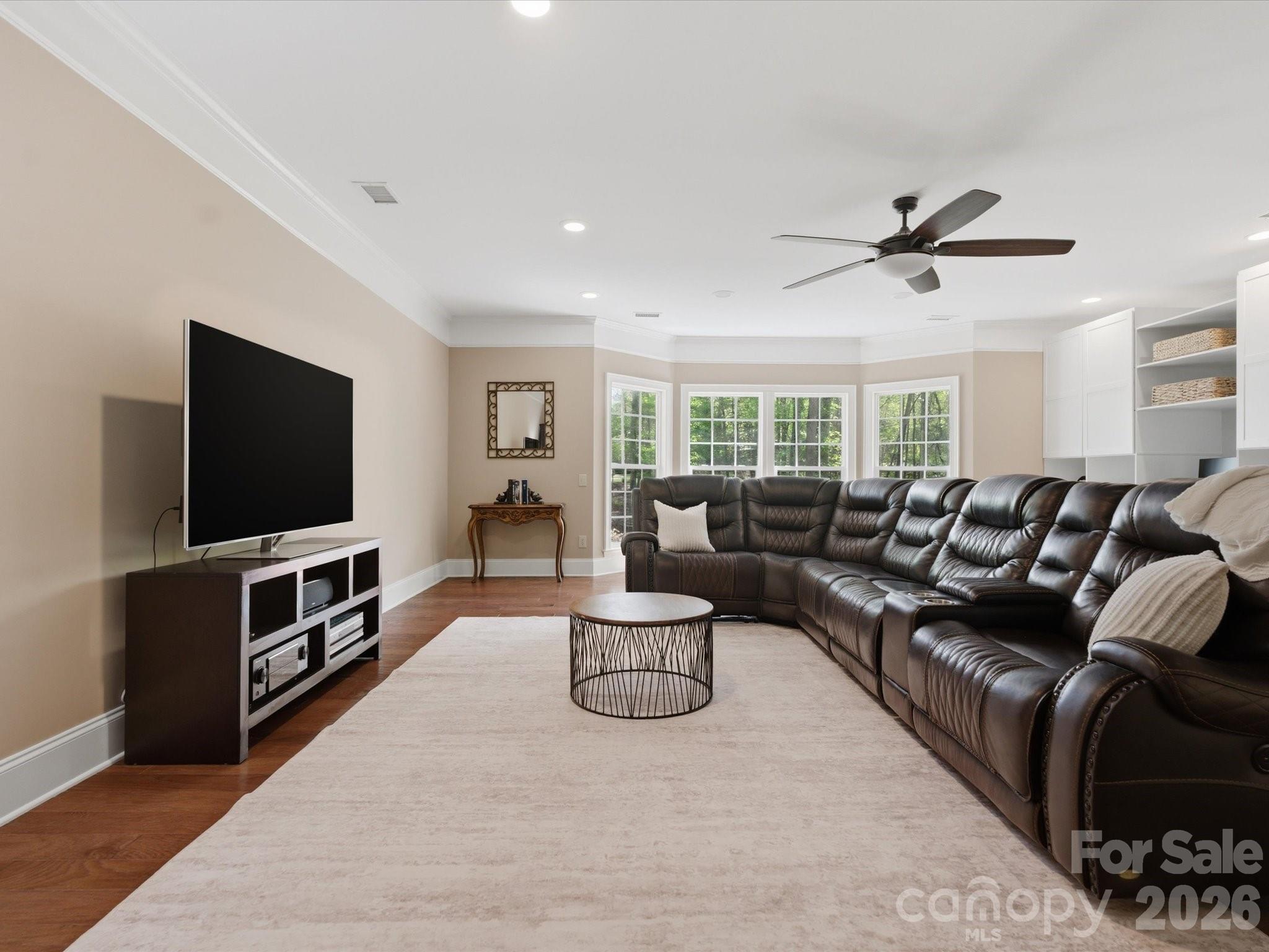 809 Savile Lane Fort Mill, SC 29715 - Photo 23 of 48 a living room with furniture and a flat screen tv