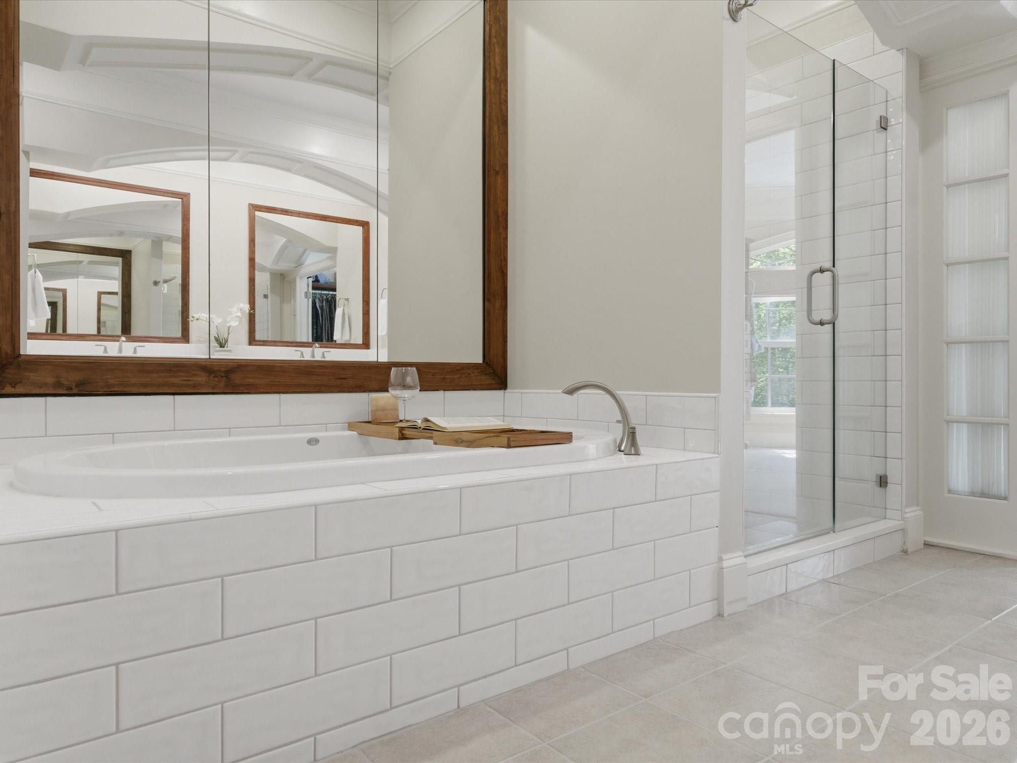 809 Savile Lane Fort Mill, SC 29715 - Photo 29 of 48 a bathroom with a bathtub and a sink