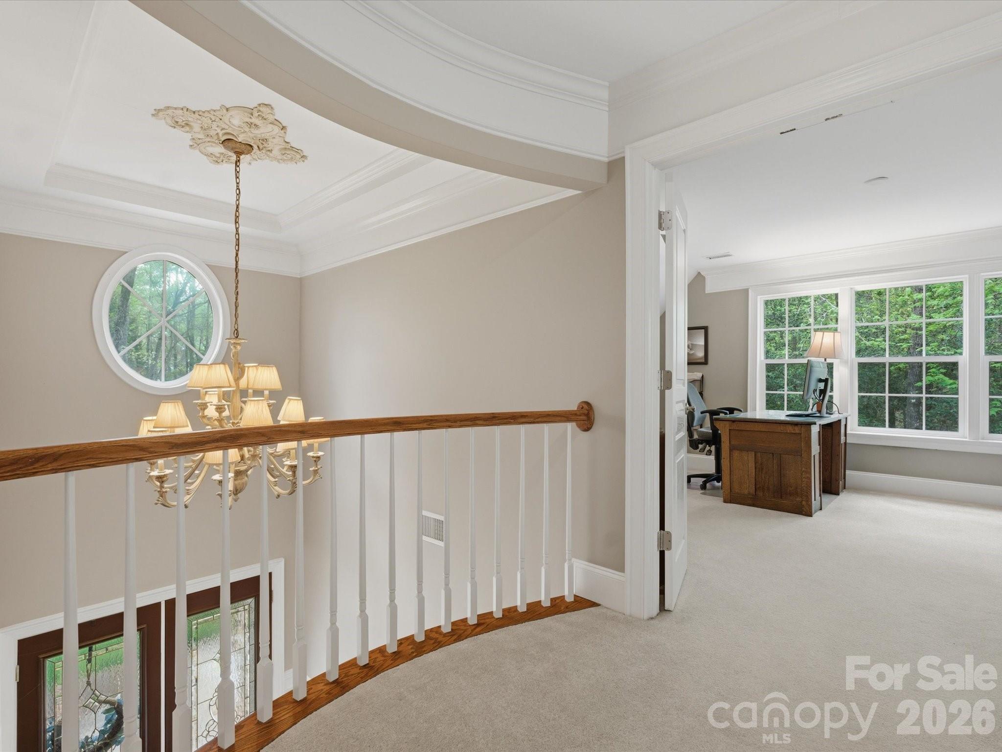 809 Savile Lane Fort Mill, SC 29715 - Photo 32 of 48 a view of a hallway with windows