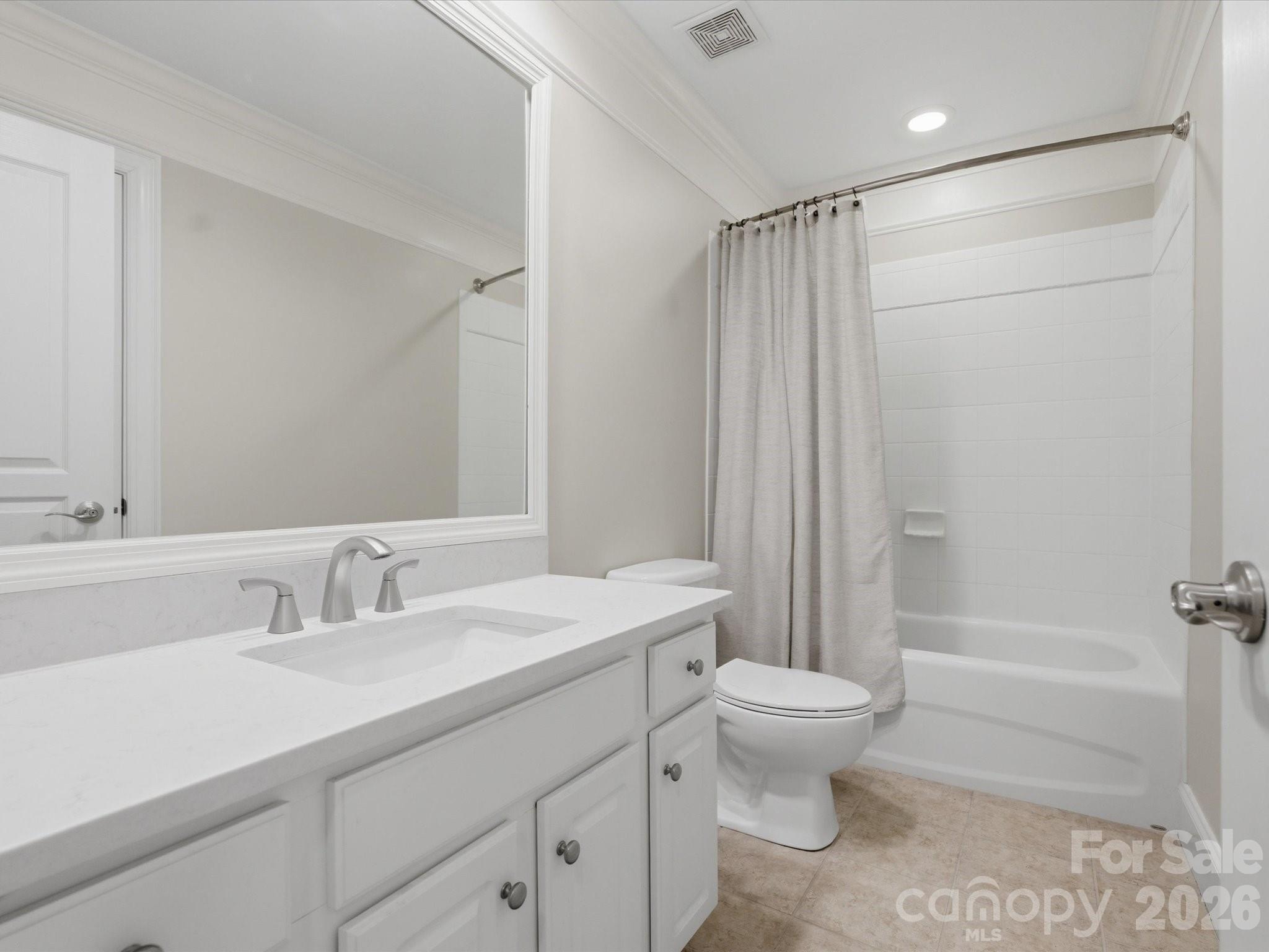 809 Savile Lane Fort Mill, SC 29715 - Photo 37 of 48 a bathroom with a sink a toilet and shower
