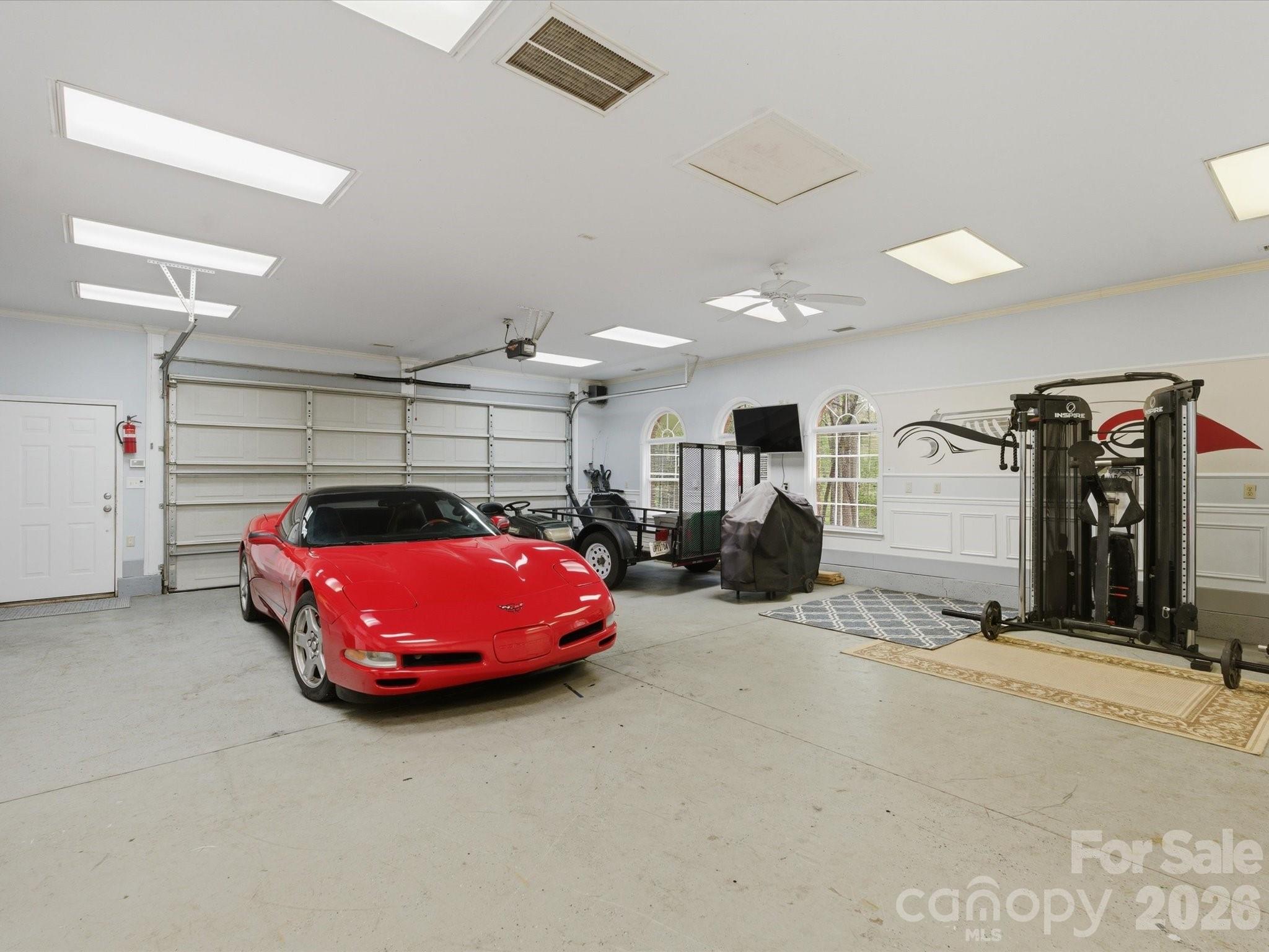 809 Savile Lane Fort Mill, SC 29715 - Photo 48 of 48 a room with gym equipment and a table