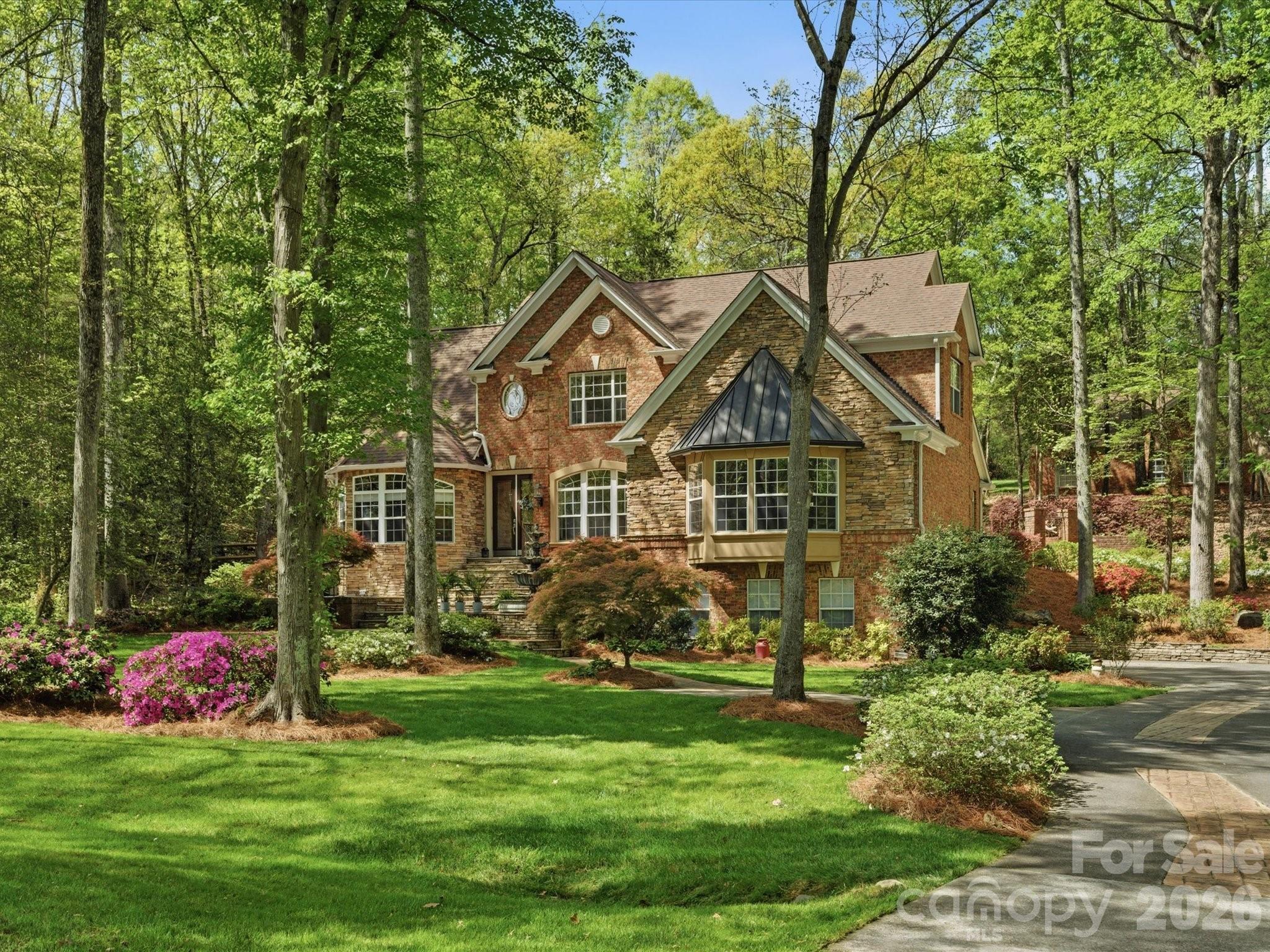 809 Savile Lane Fort Mill, SC 29715 - Photo 6 of 48 a front view of a house with garden