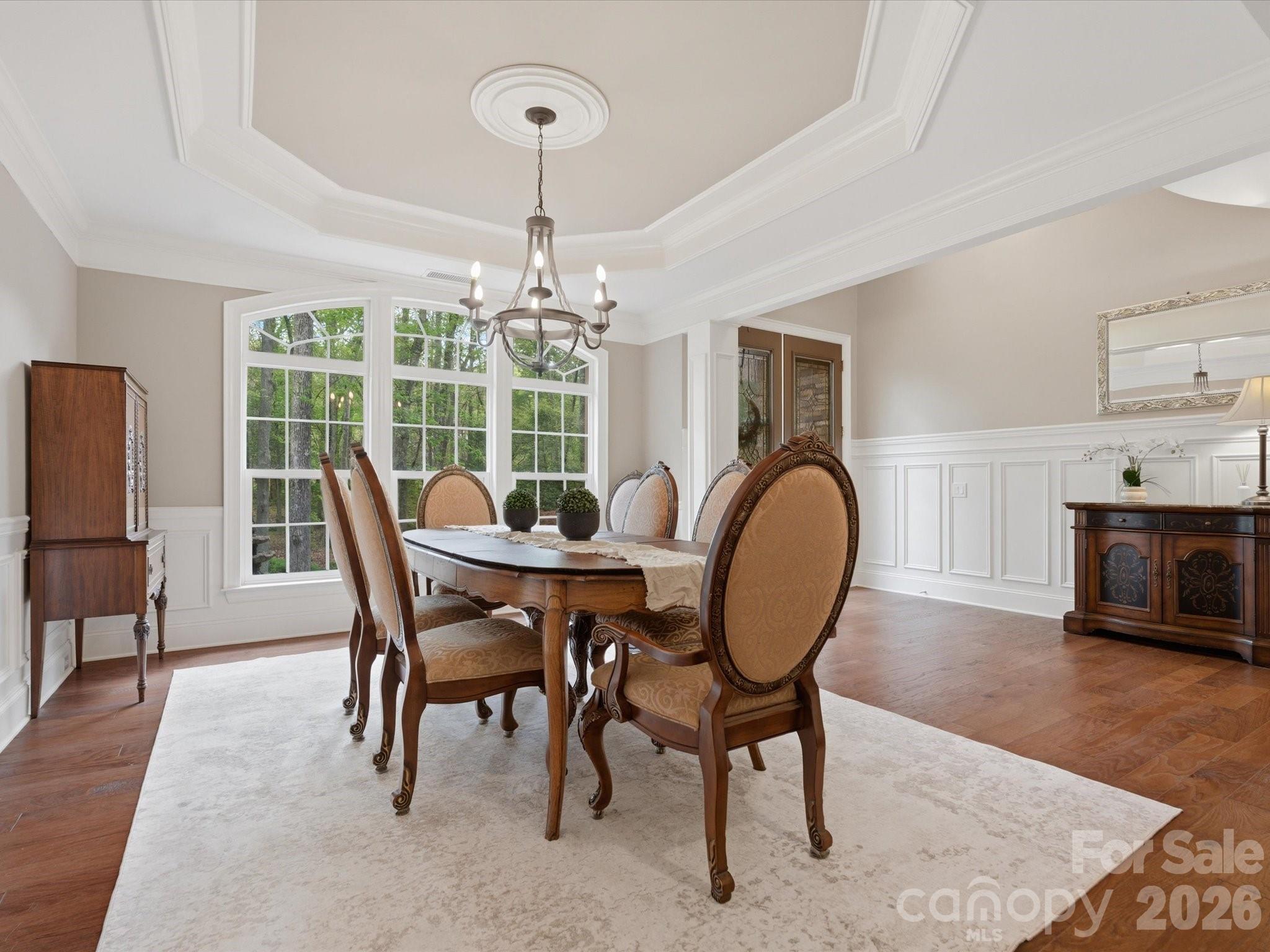 809 Savile Lane Fort Mill, SC 29715 - Photo 10 of 48 a view of a dining room with furniture window and wooden floor