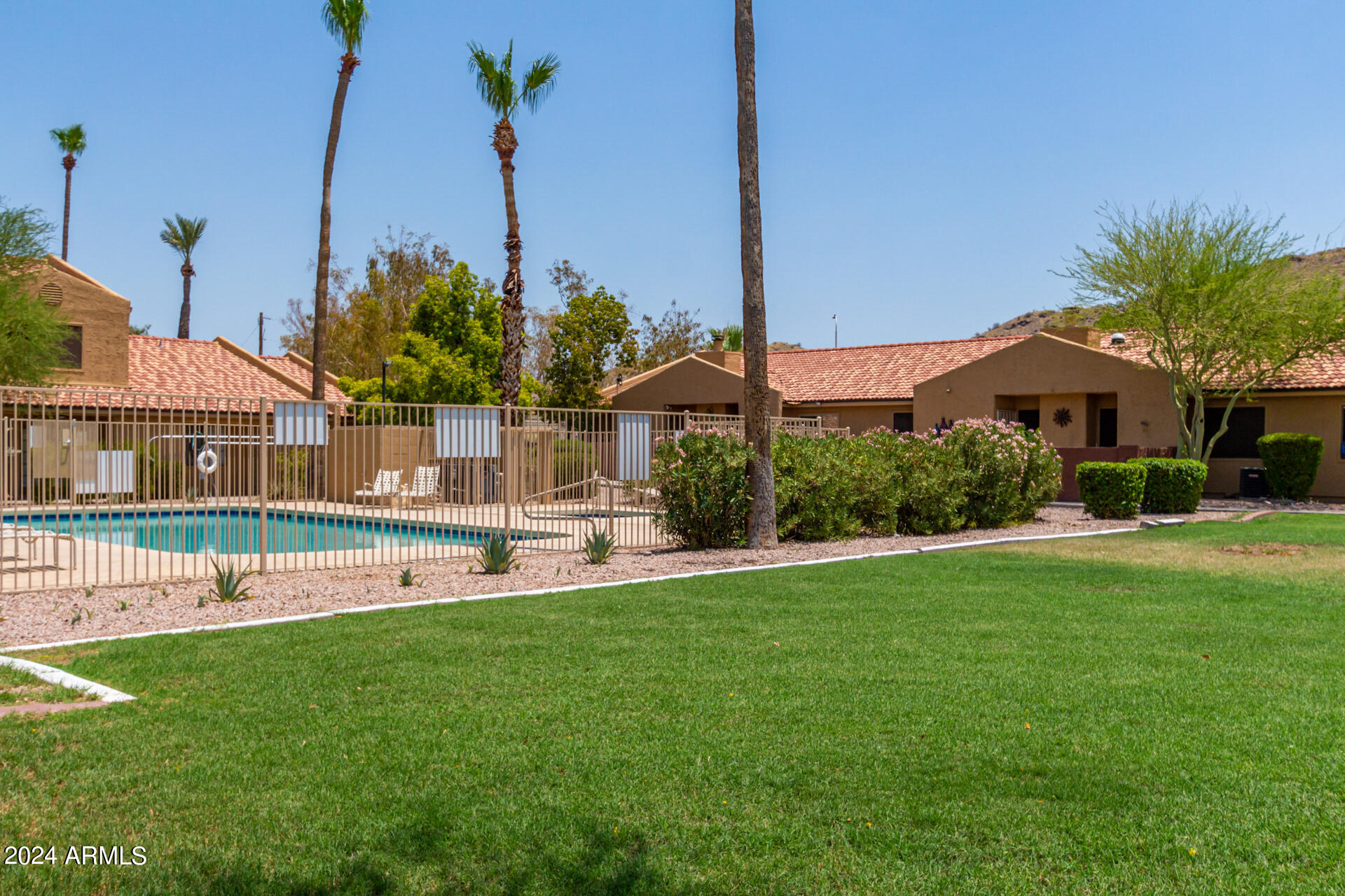 3511 East Baseline Road, Unit 1089 Phoenix, AZ 85042 - Photo 20 of 22 Large Grassy Area for Kids and Pets
