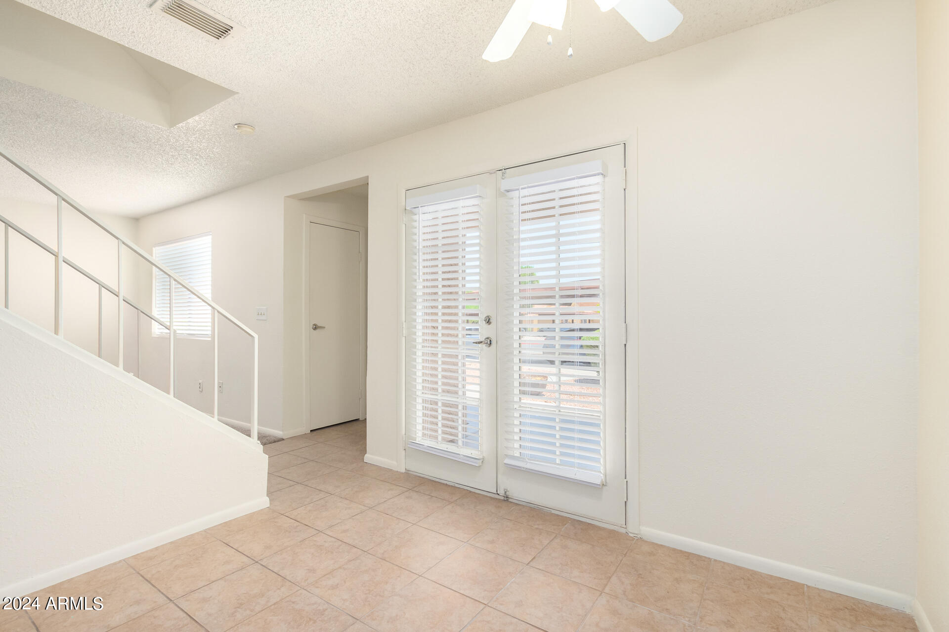 3511 East Baseline Road, Unit 1089 Phoenix, AZ 85042 - Photo 7 of 22 French Doors to Patio